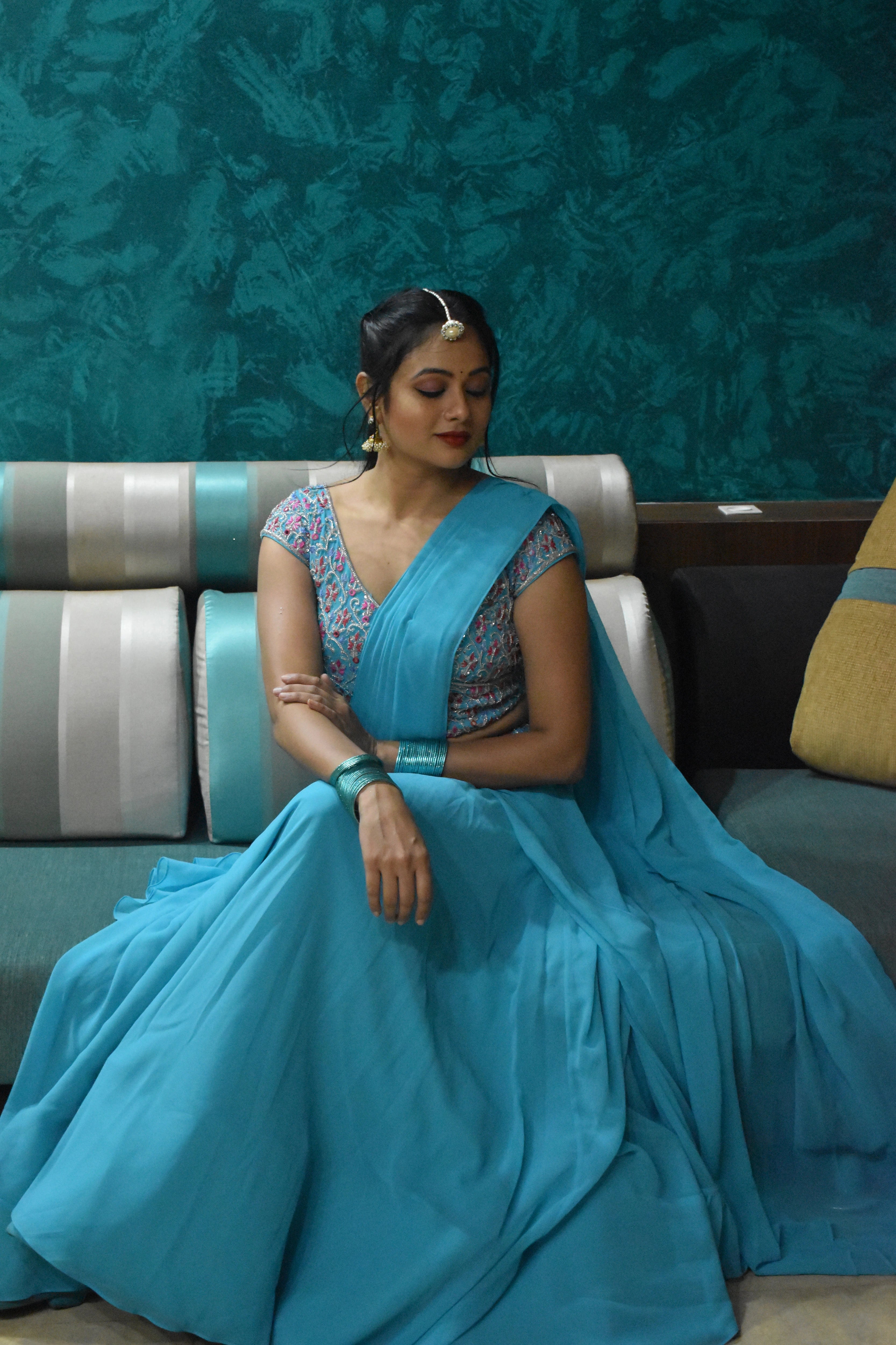 Actress Archita Sahu in a blue georgette draped lehenga, intricately handcrafted with sequins, mirror, cutdana and resham by team Archana Karthick.