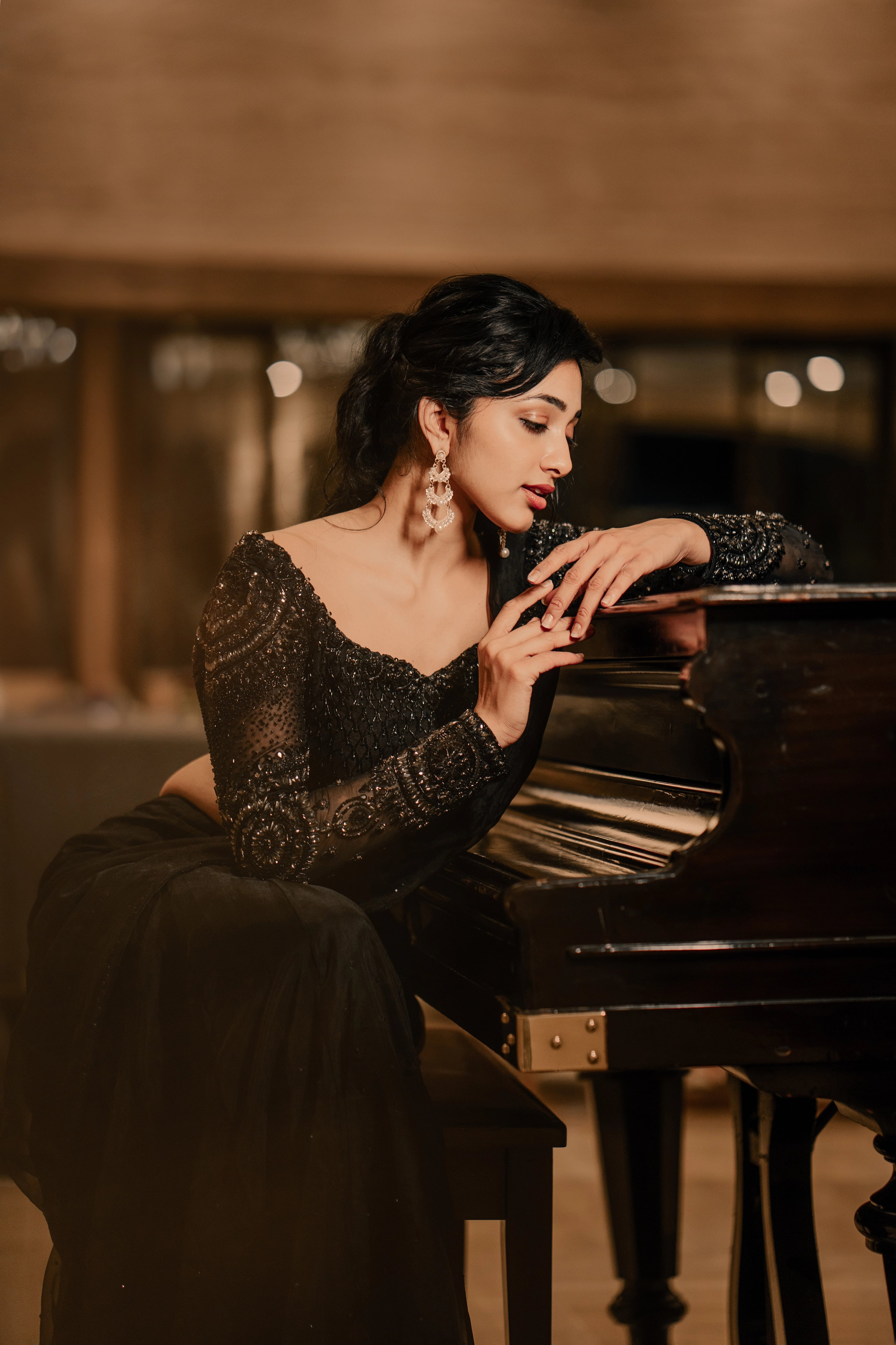 Actress & dancer Preity Mukhundhan during a photoshoot in "The Black Mermaid" black mermaid lehenga saree from Archana Karthick's collection.