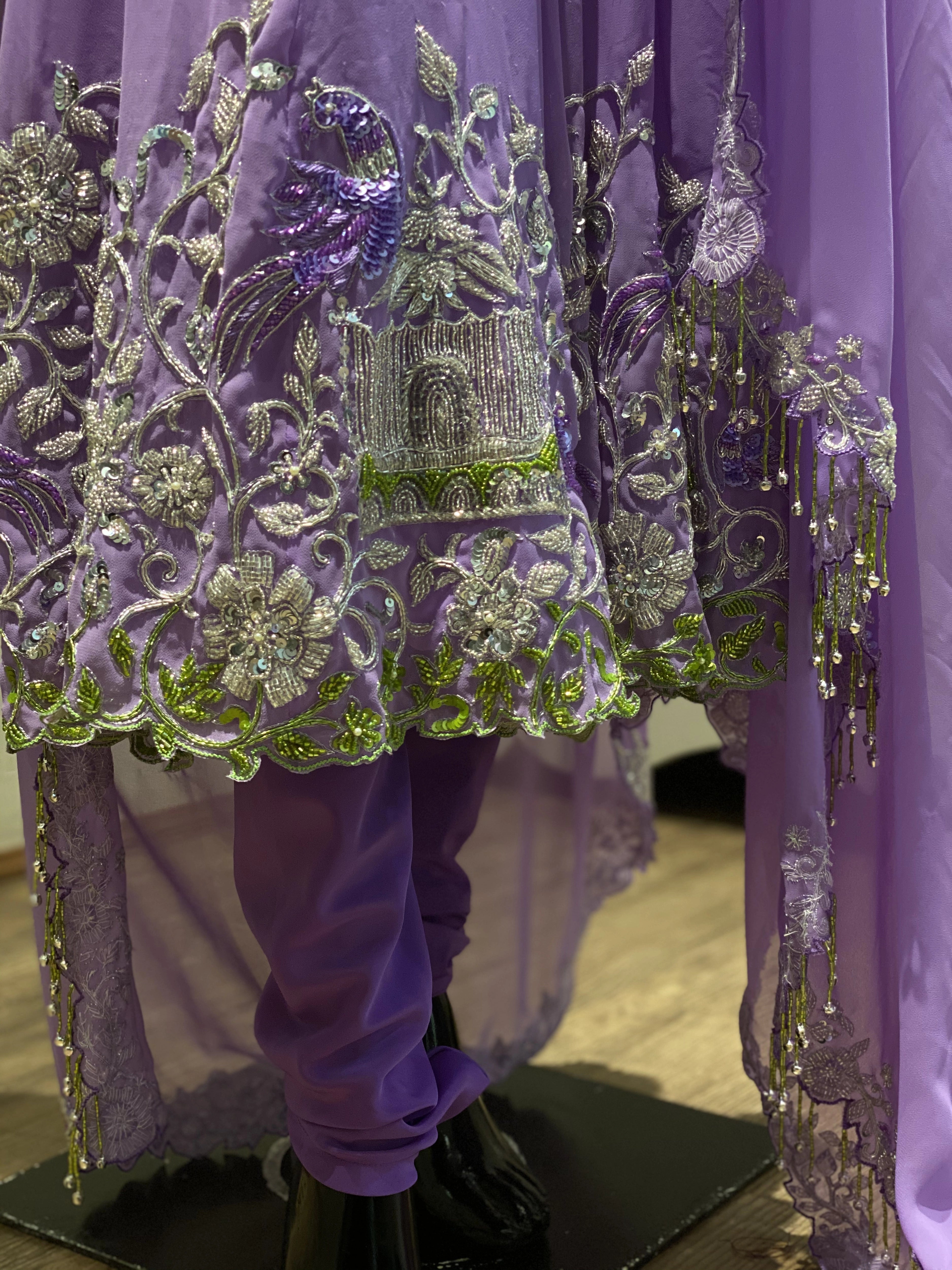 Archana Ajay Kumar's lavender anarkali, intricately handcrafted with cutdana, sequins and zardozi by team Archana Karthick being showacsed on a mannequin.