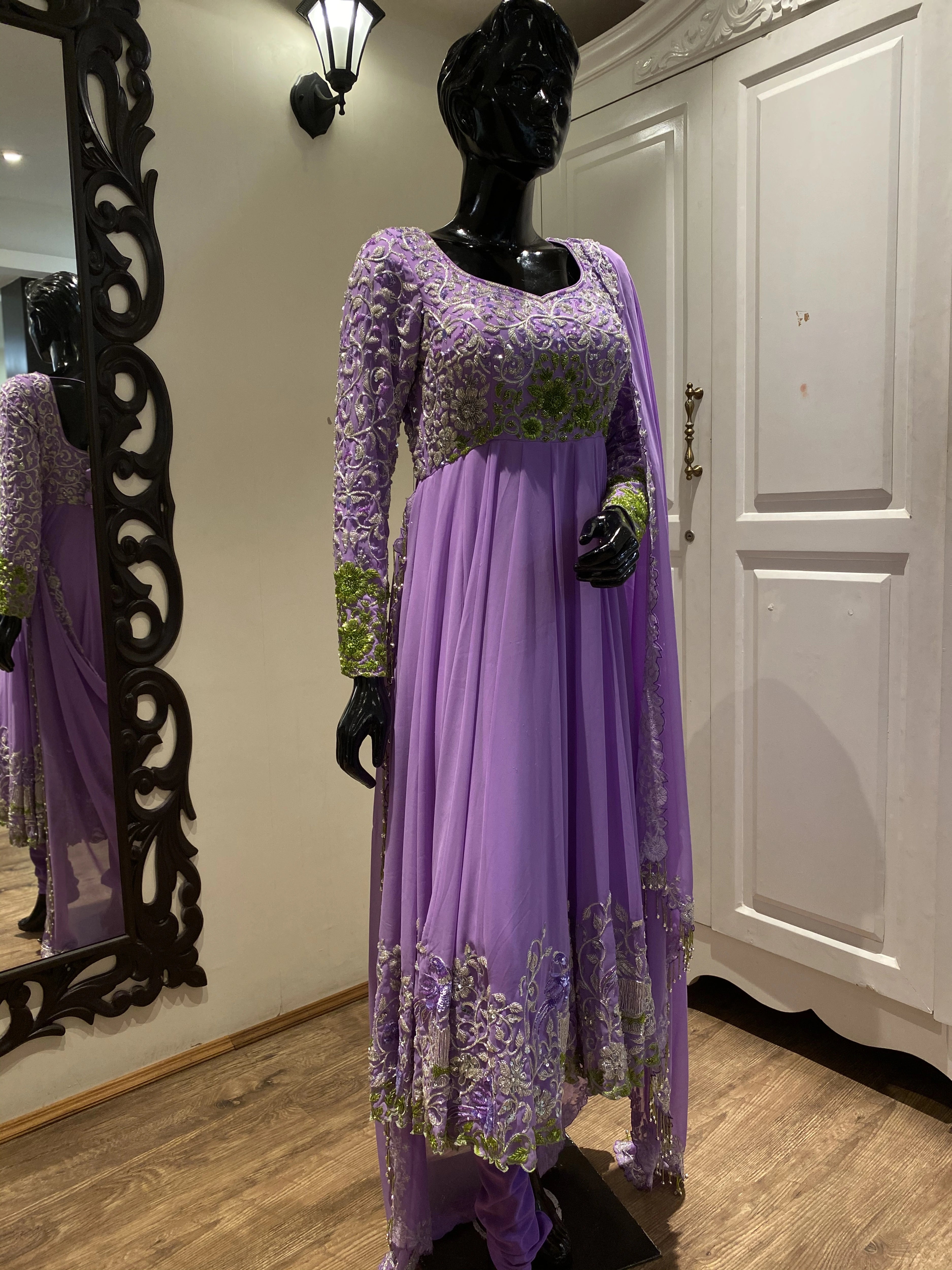 Archana Ajay Kumar's lavender anarkali, intricately handcrafted with cutdana, sequins and zardozi by team Archana Karthick, showcased on a mannequin.