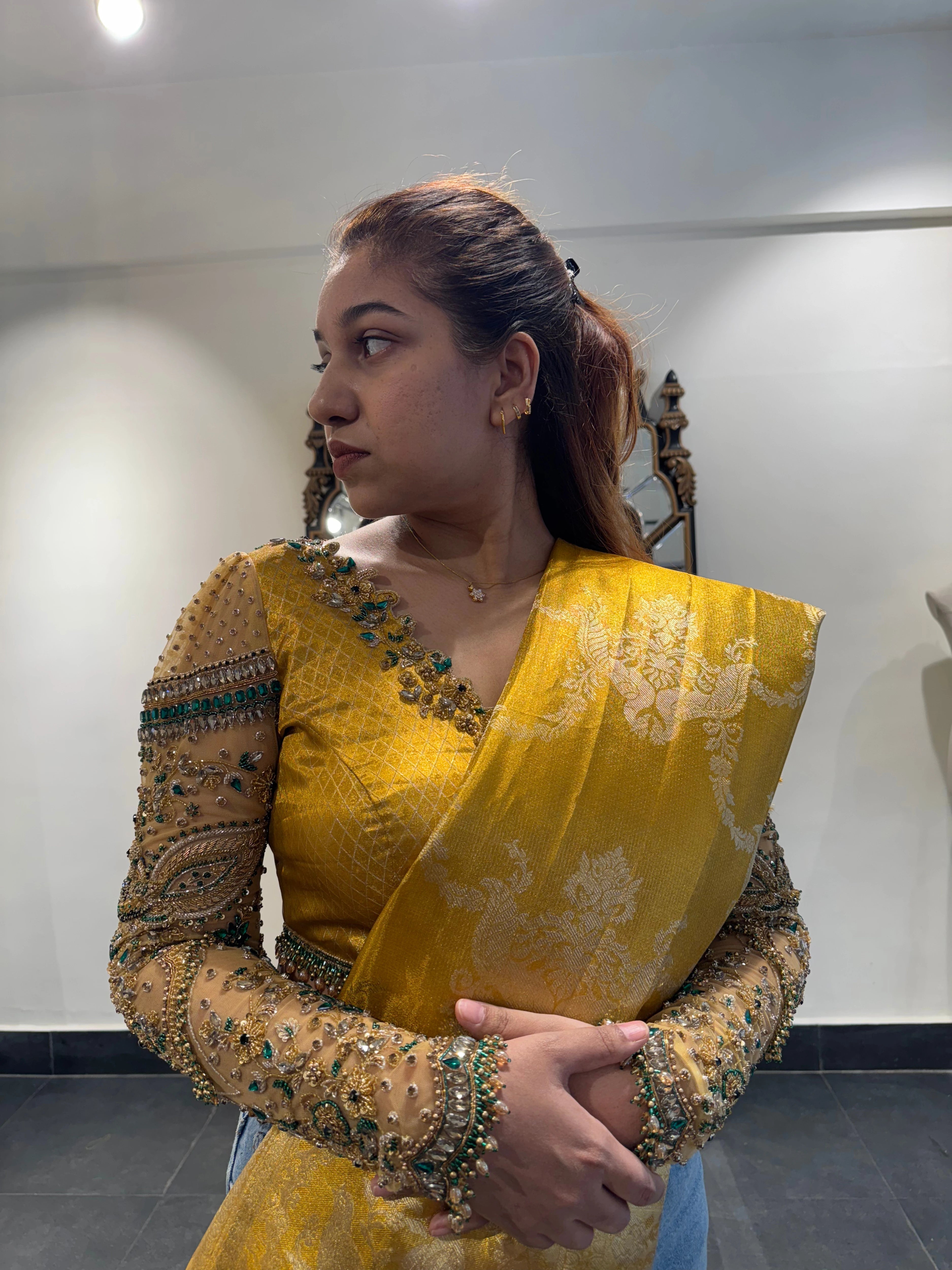 Bhavana during her fittings in a yellow silk blouse by team Archana Karthick.