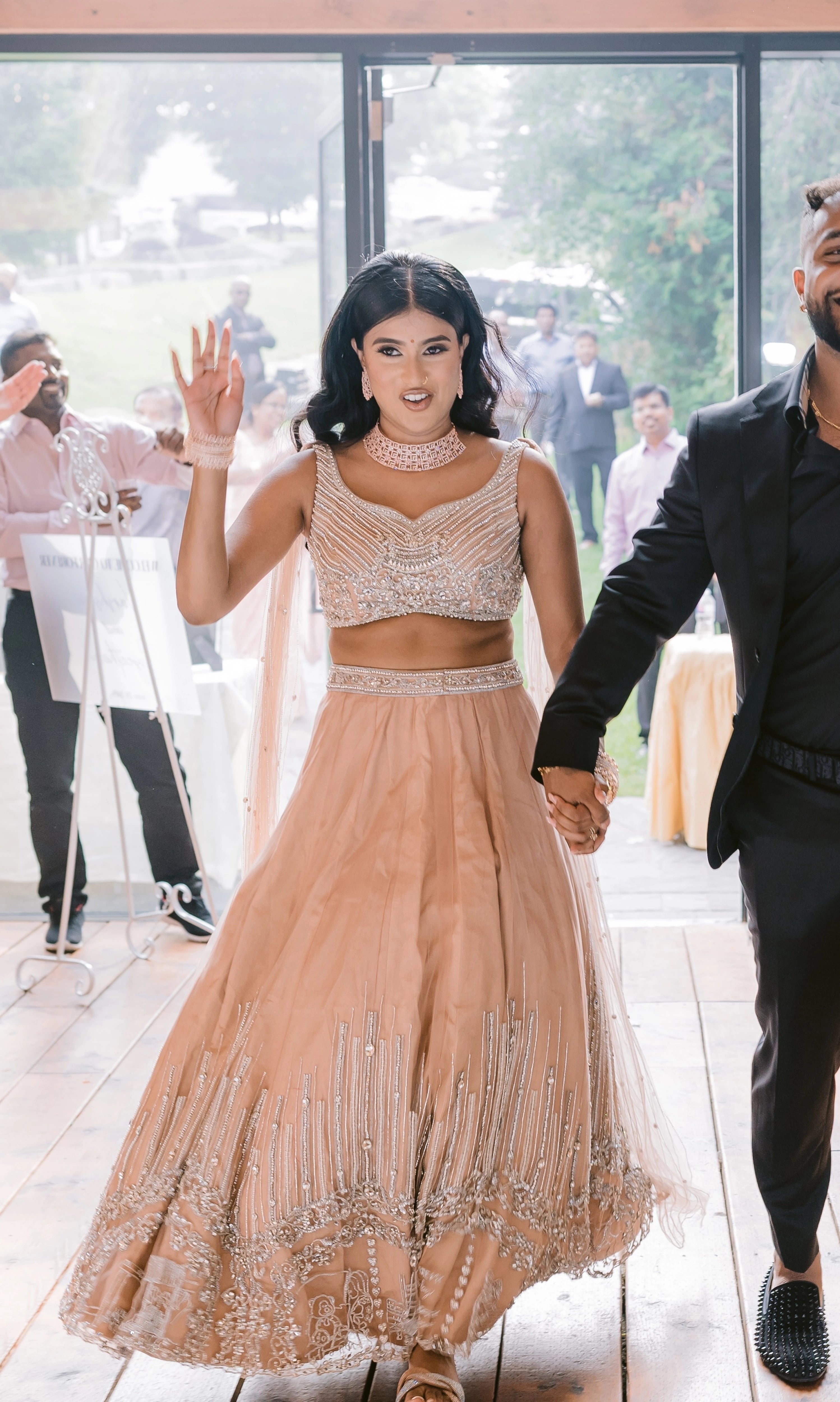 Bride Apy from Canada in a blush (shades of peach cream) lehenga, handcrafted by team Archana Karthick.