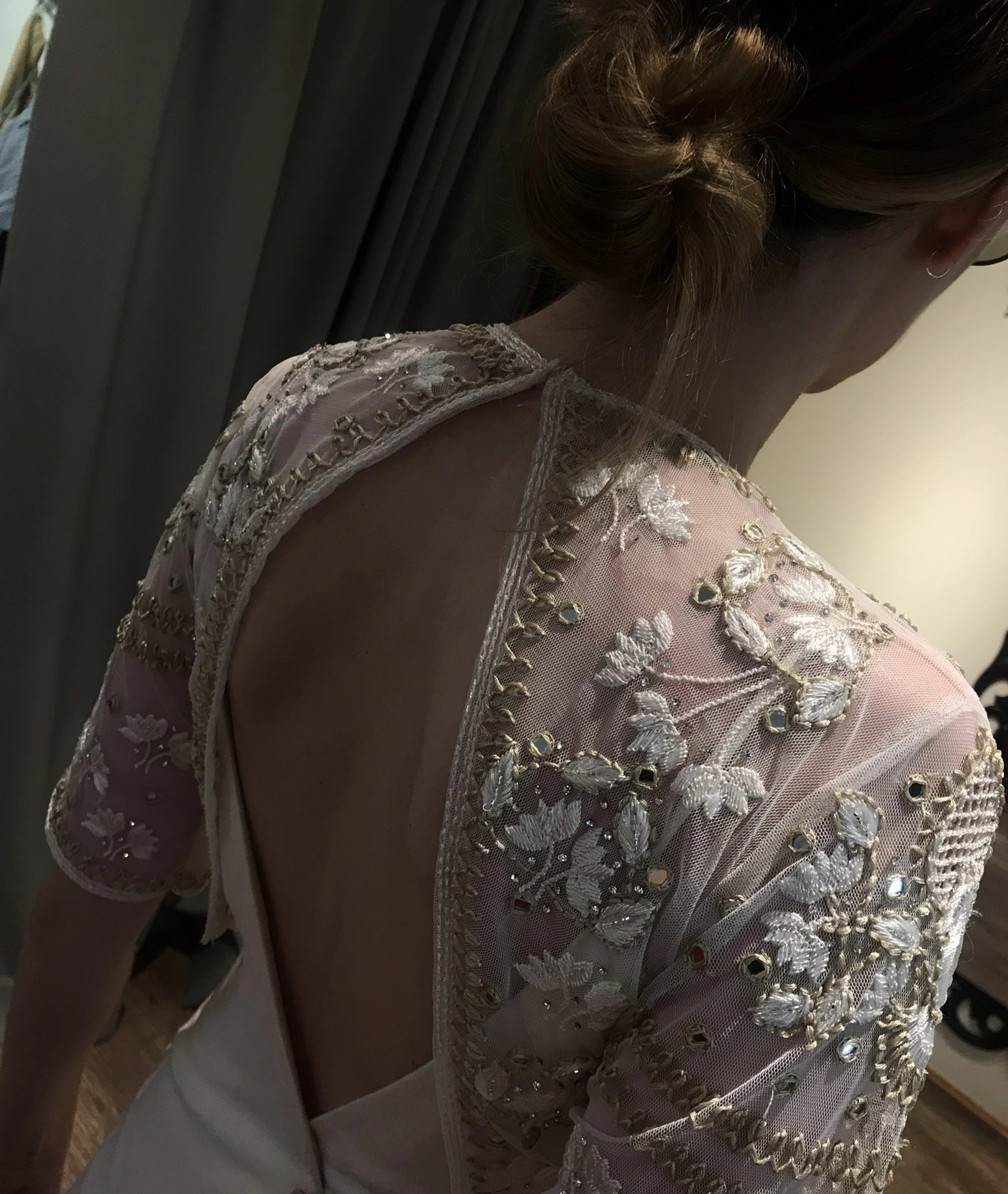 Bride Catriona from Scotland, during fittings in a white gown for her beach wedding, handcrafted by team Archana Karthick.