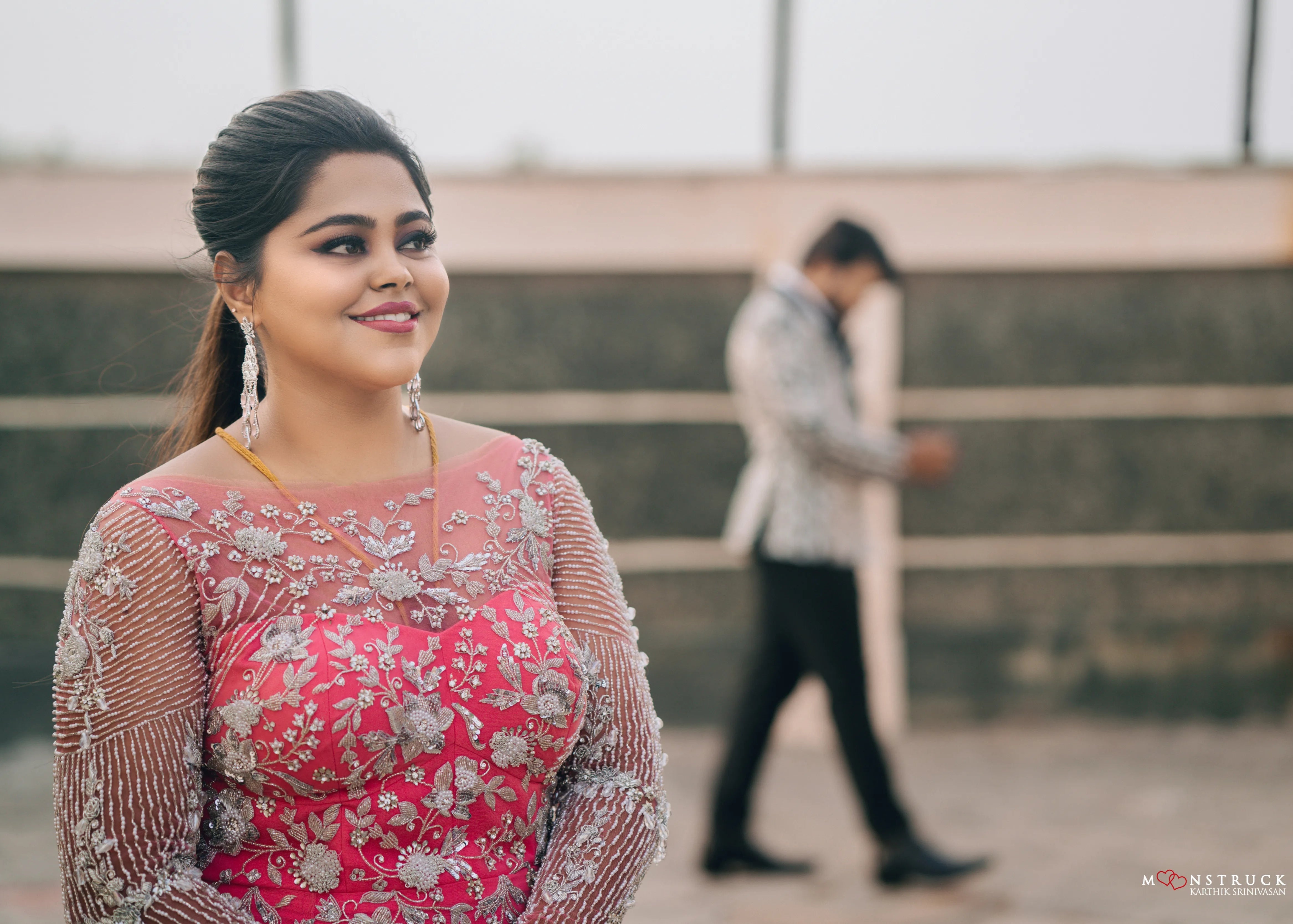 Bride (Coimbatore) in handcrafted pink tulle gown and and Groom (Chennai) in embeliished jacket for their reception photoshoot.