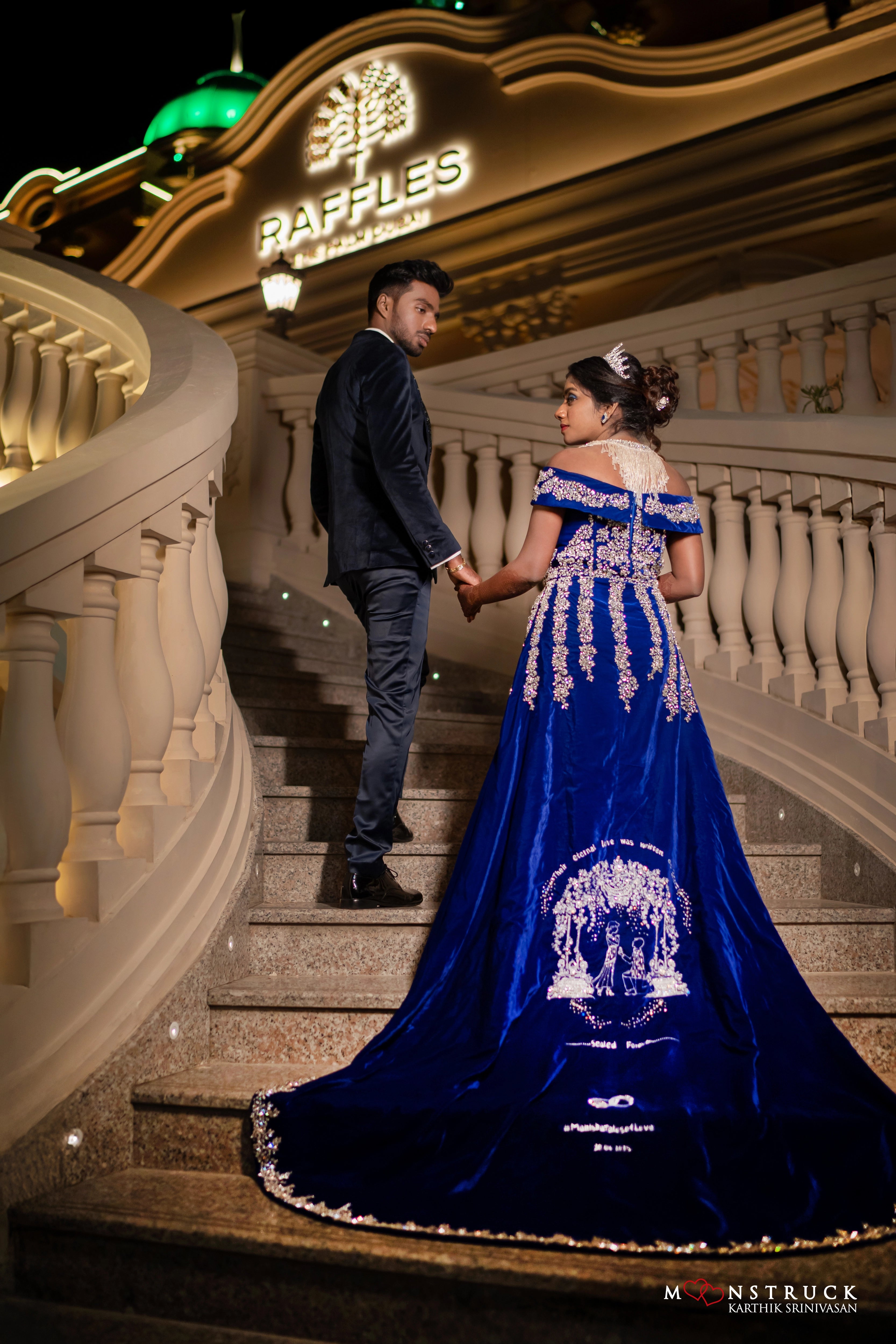 Bride Harsha in a blue velvet gown by team Archana Karthick.