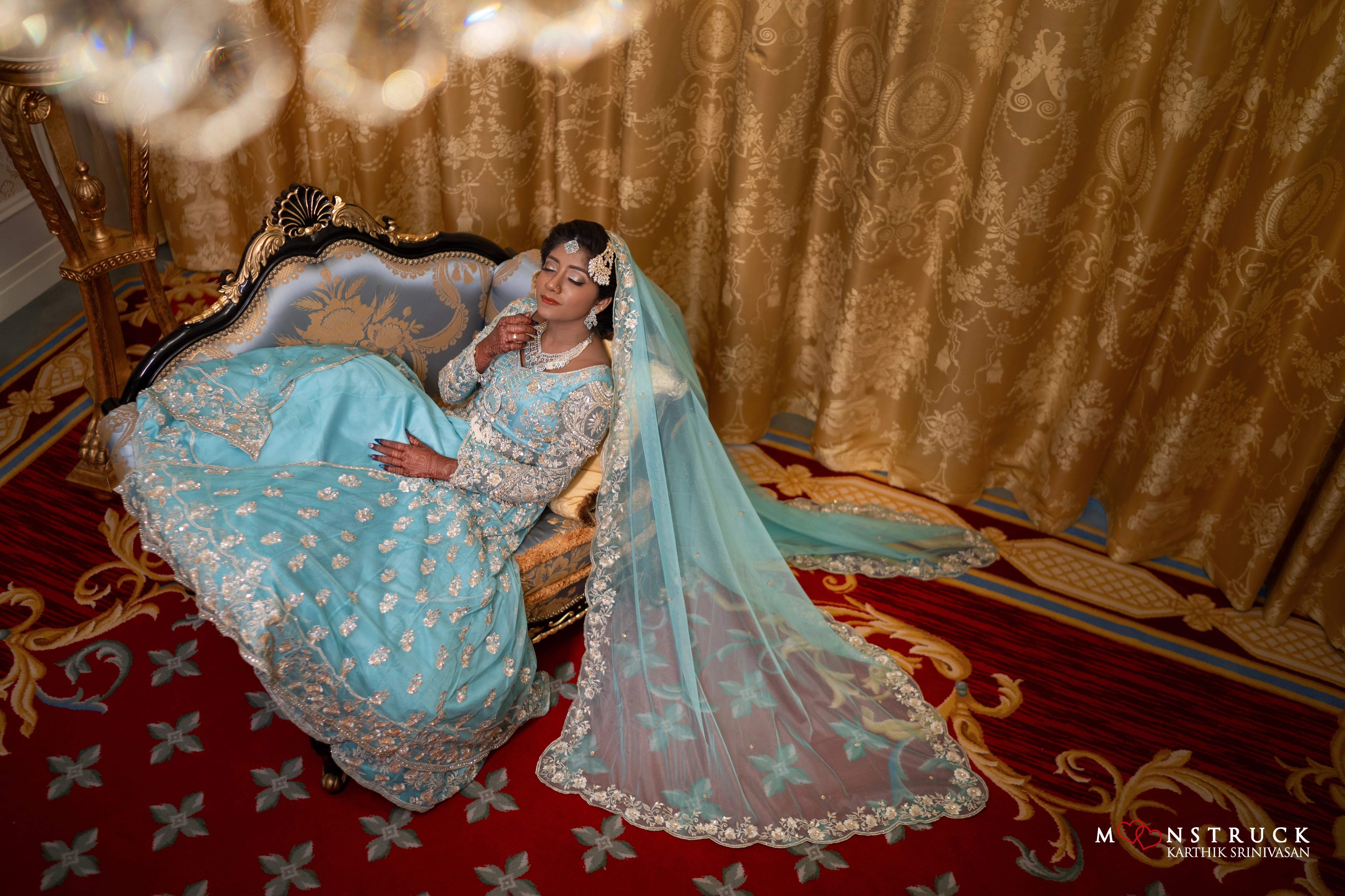 Bride Harsha in a sea green masakali lehenga by Archana Karthick
