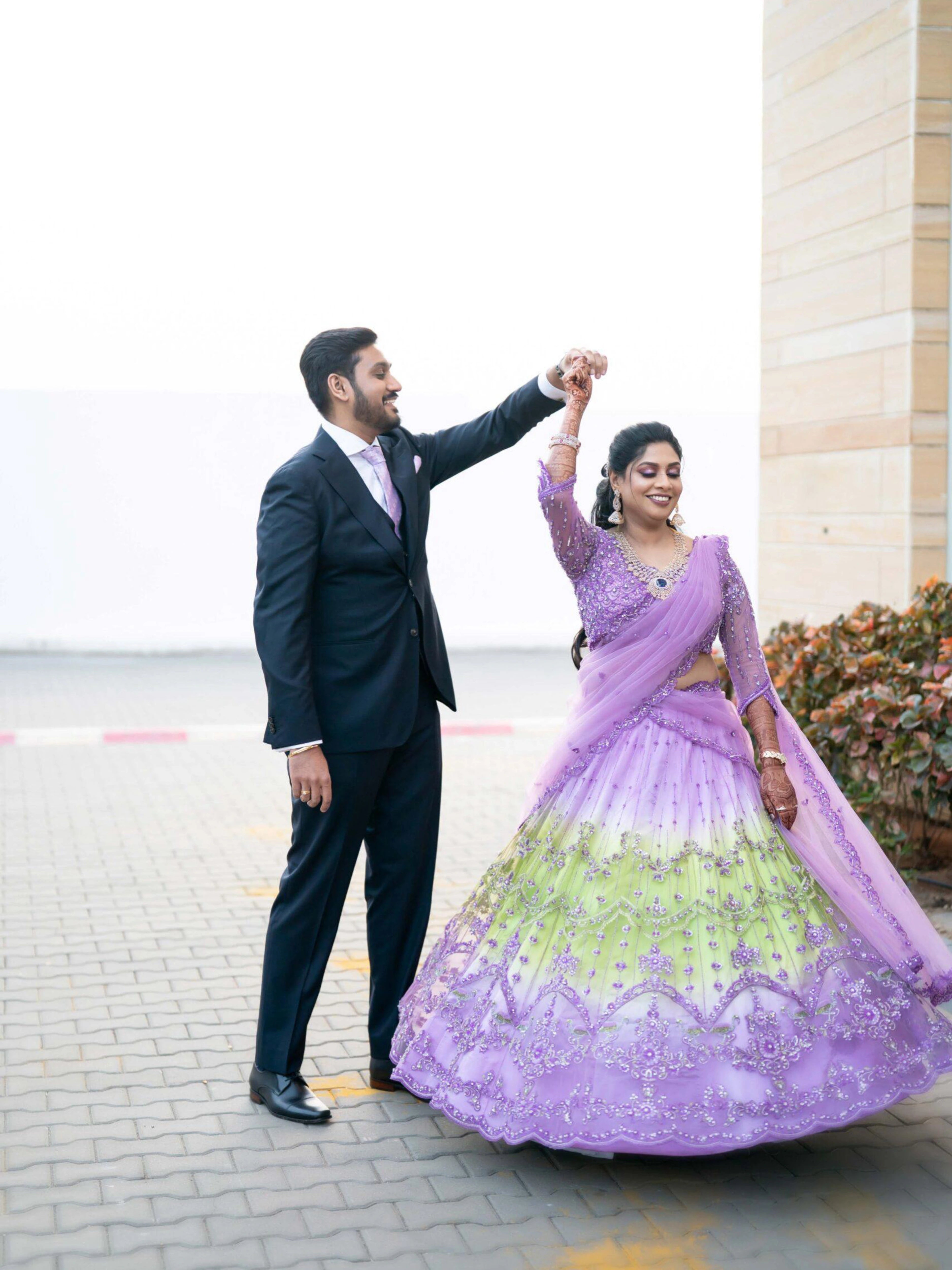 Bride Keerti in a lavender & green tulle lehenga, intricately handcrafted with sequins, cutdana, beads, crystals, rhinestones & zardozi by team Archana Karthick