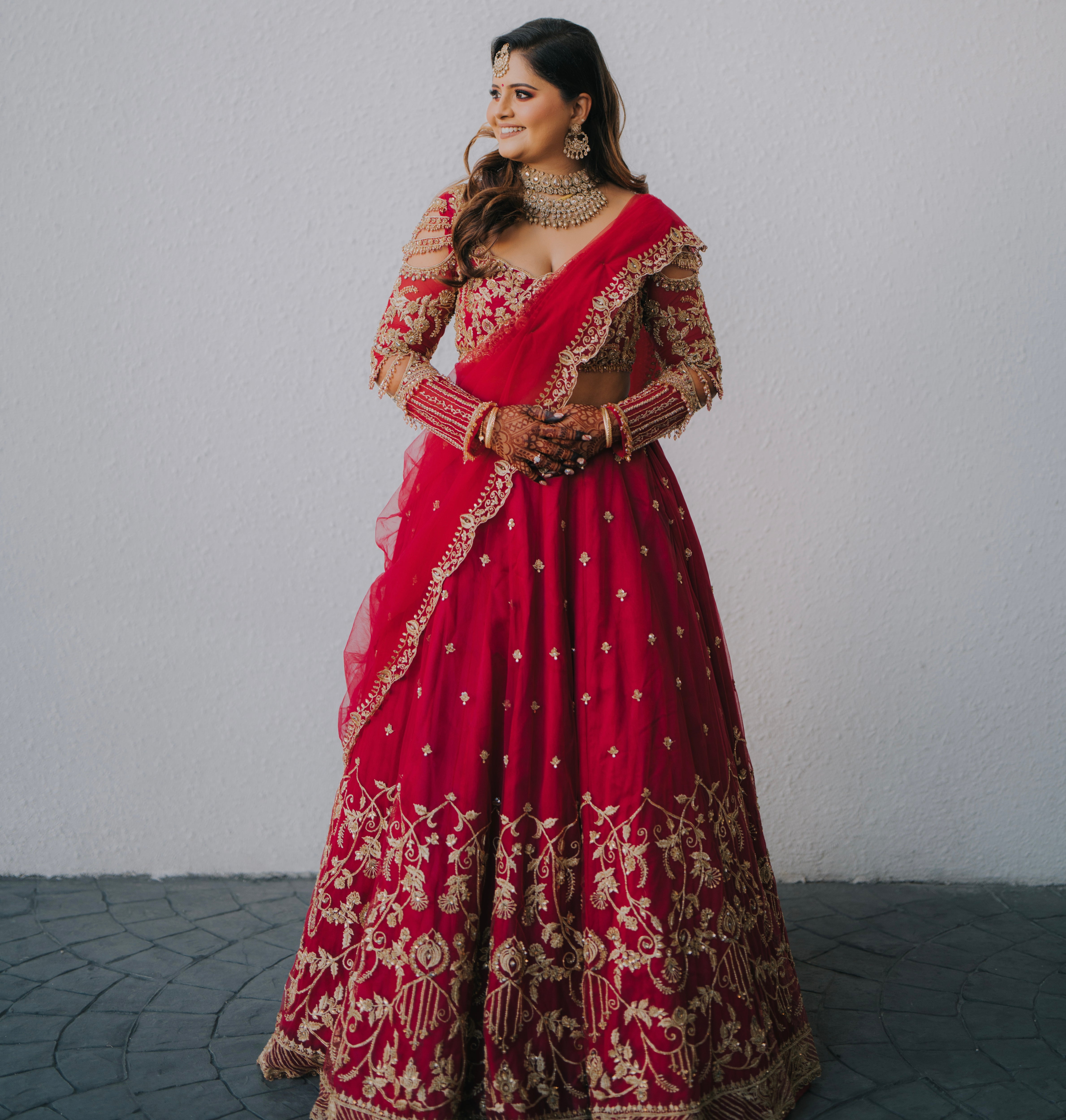 Bride Kritini Naidu from Malaysia in a pink lehenga by Archana Karthick