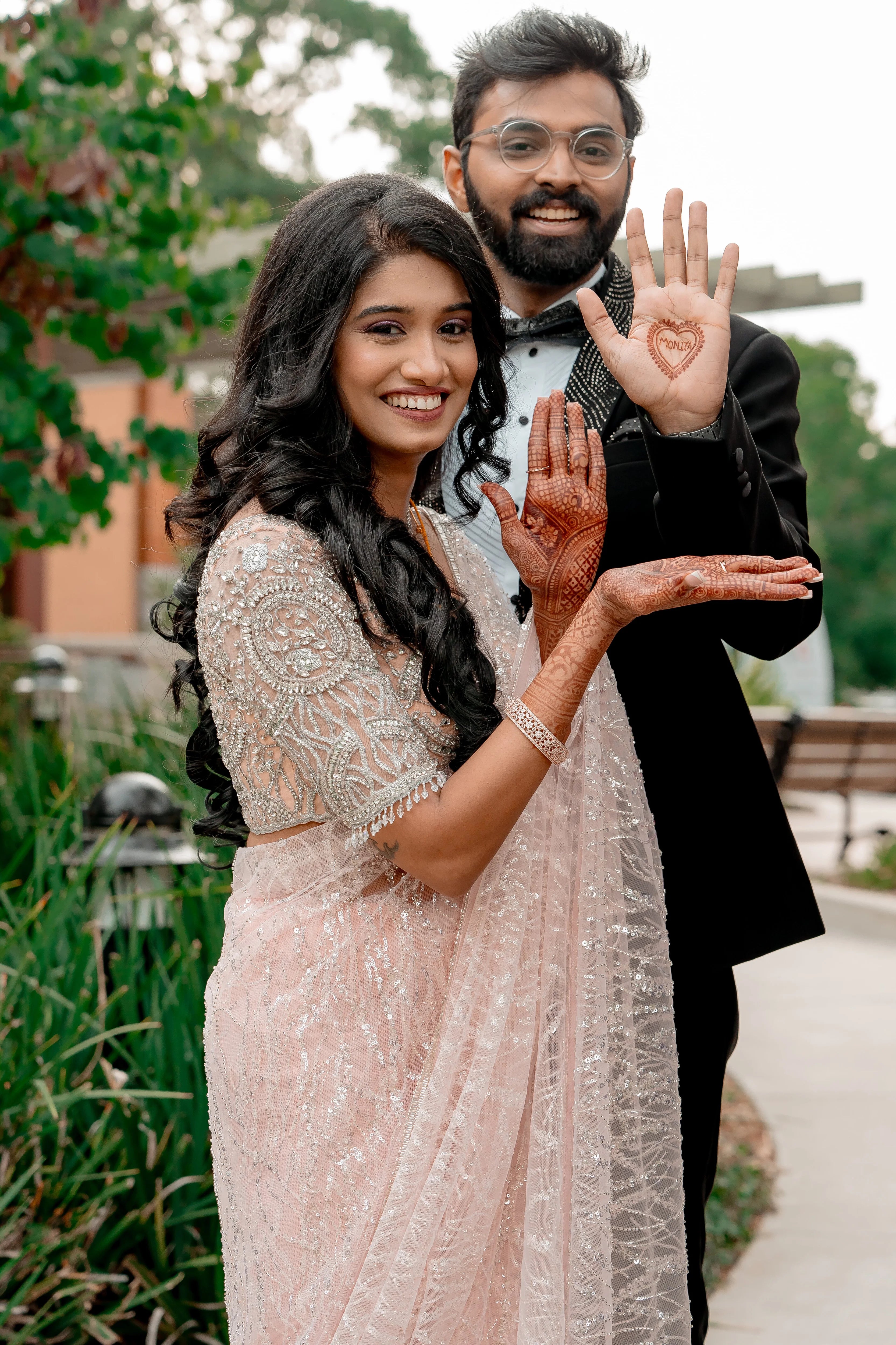 Bride Monica from USA in a blush tulle blouse handcrafted by team Archana Karthick.