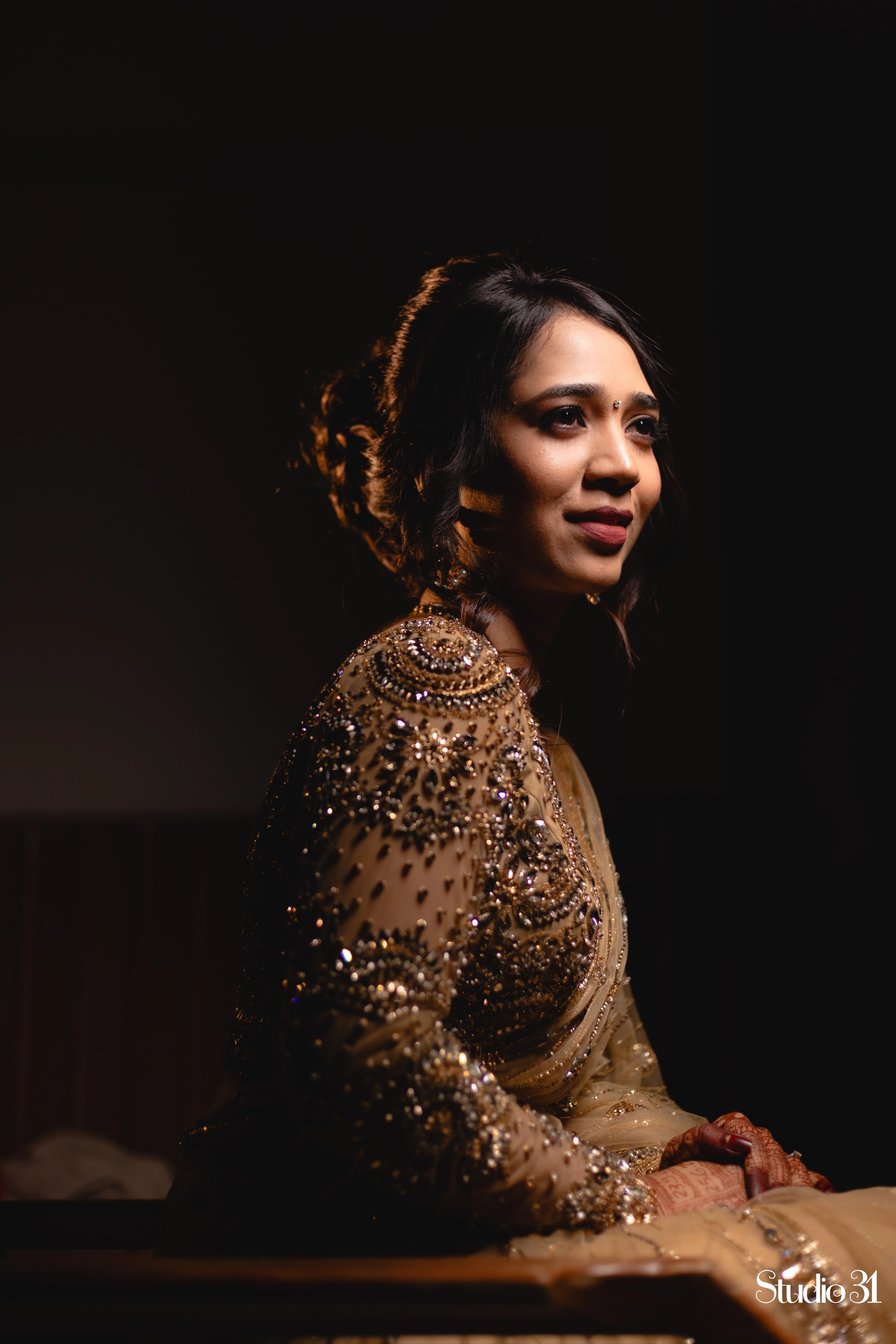 Bride Narmada in a golden beige tulle saree handcrafted by team Archana Karthick.