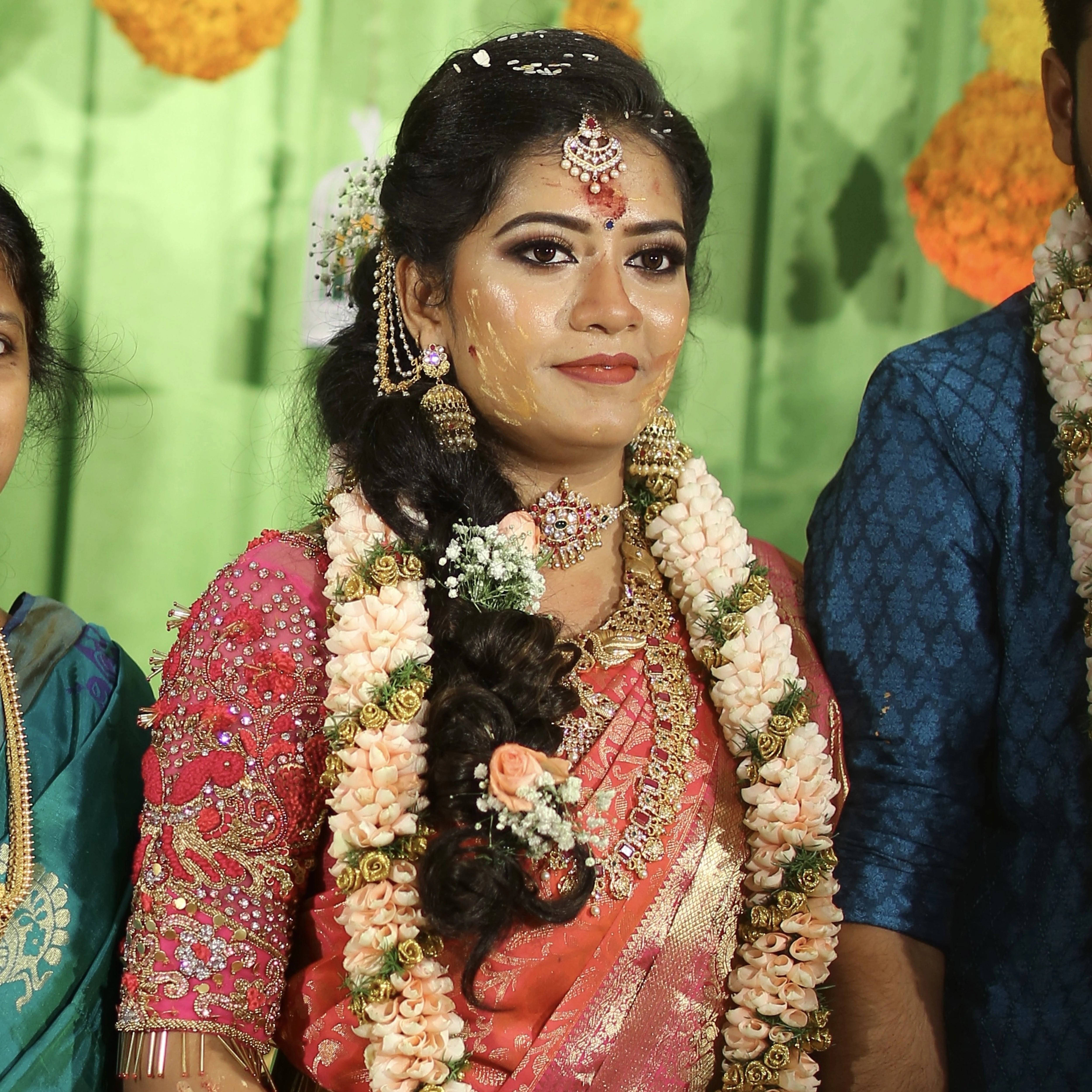 Bride Preethi Shiva during wedding in a silk blouse handcrafted by team Archana Karthick.