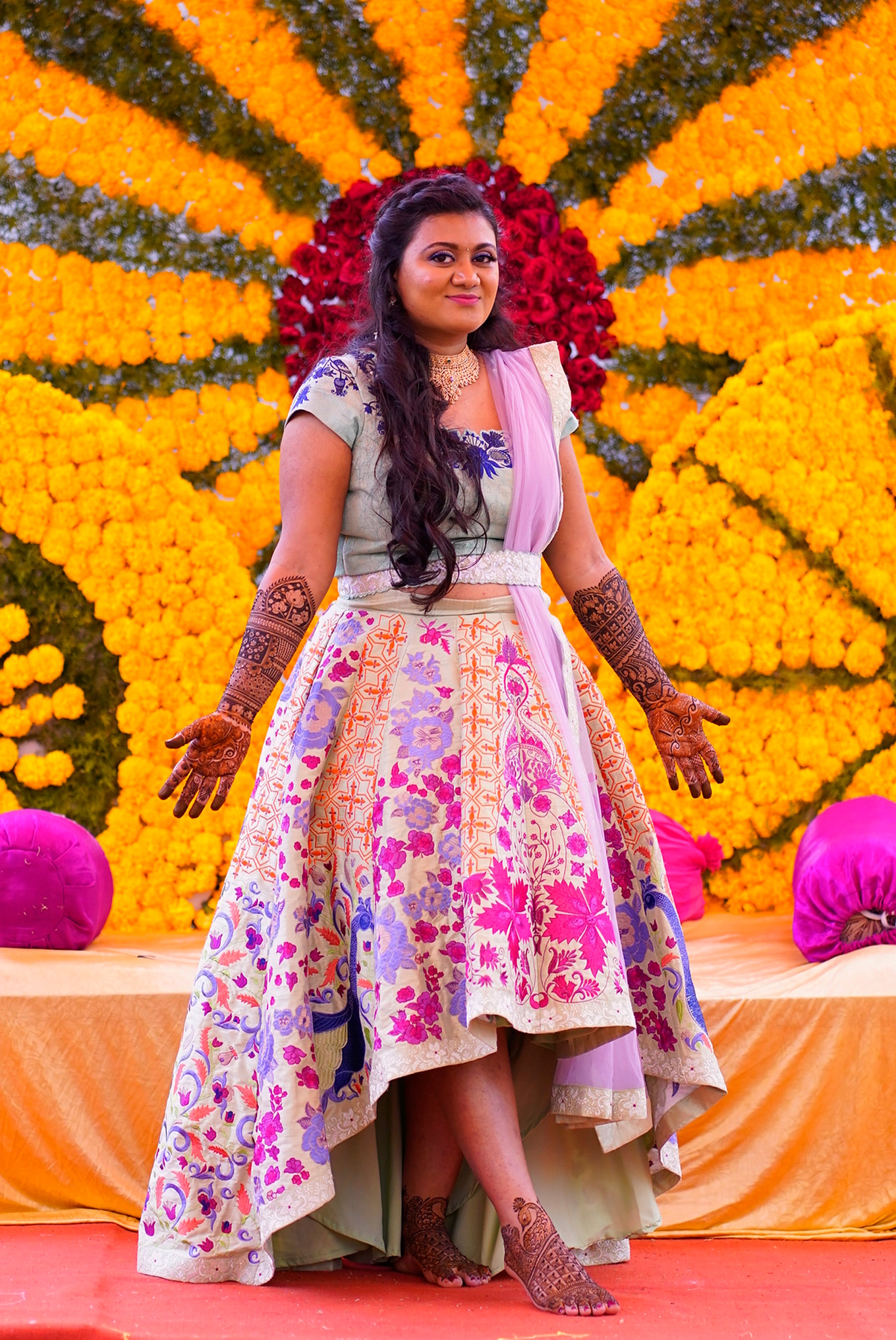Bride Sowmya Rani from Hyderabad in a pastel pistachio green lehenga handcrafted by team Archana Karthick.