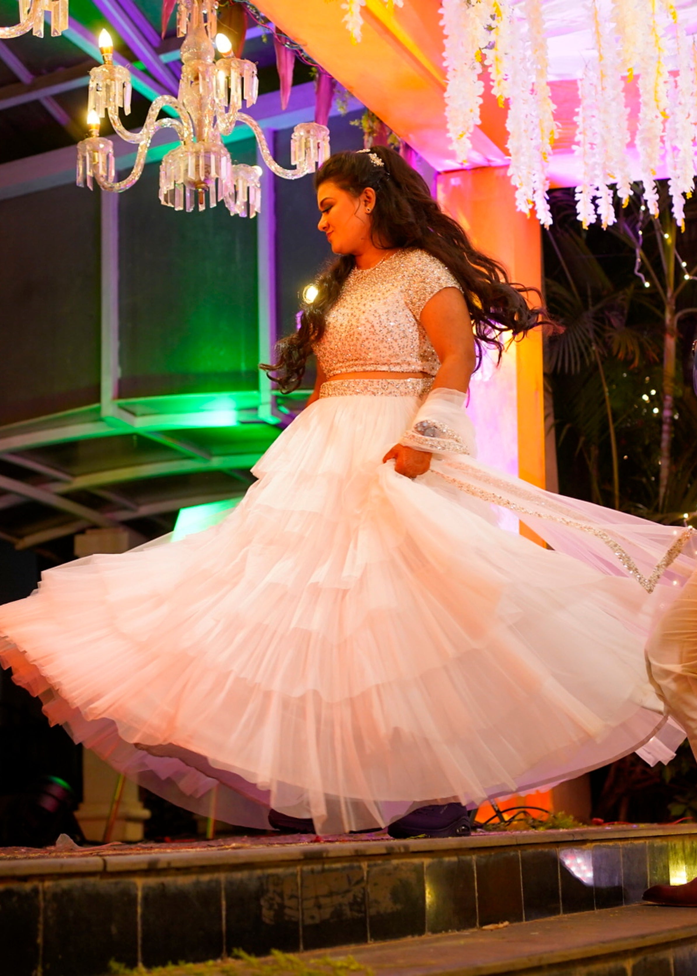 Bride Sowmya Rani from Hyderabad in a white lehenga handcrafted by team Archana Karthick.