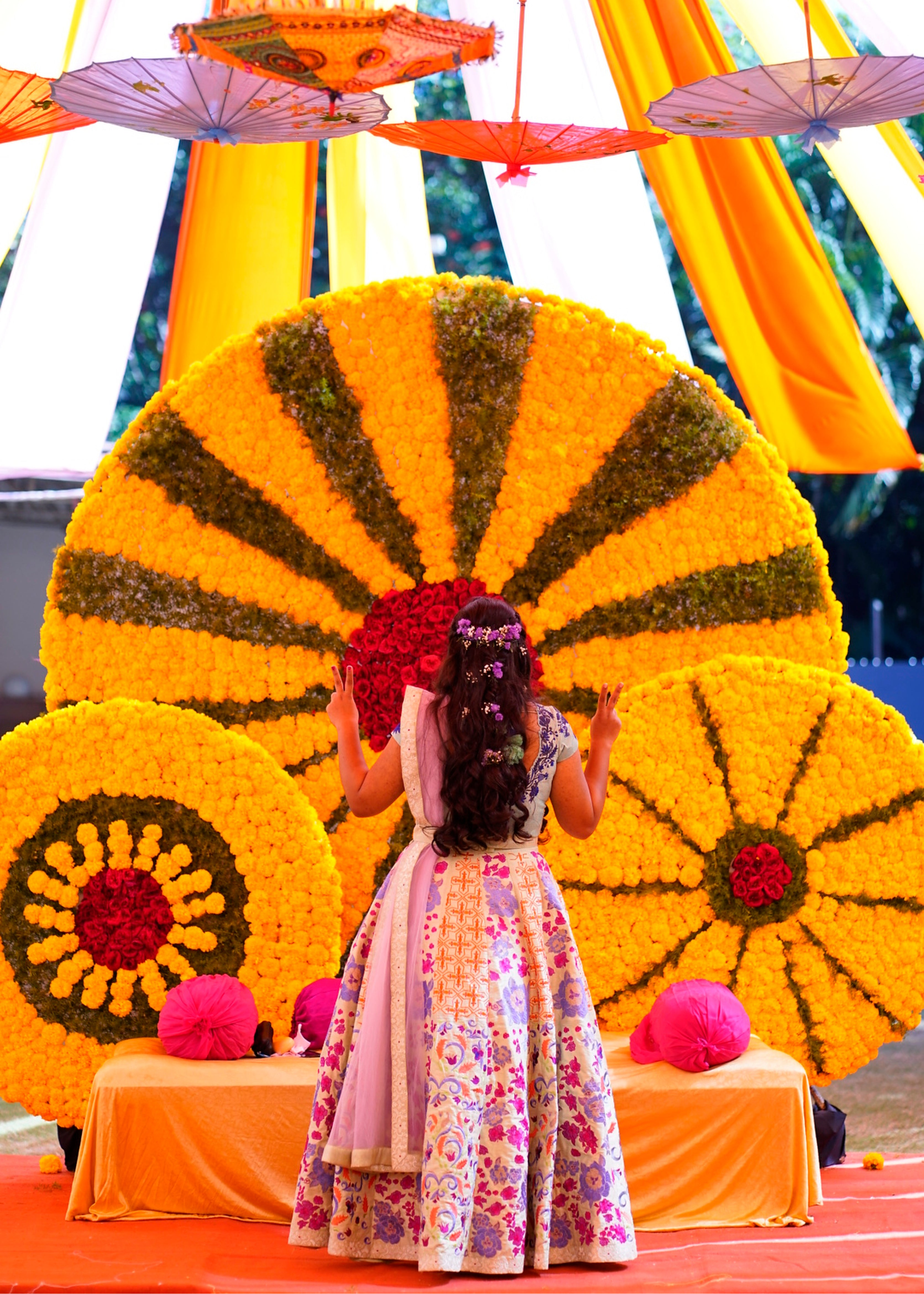 Bride Sowmya Rani from Hyderabad posing for photo in a pastel pistachio green lehenga handcrafted by team Archana Karthick.