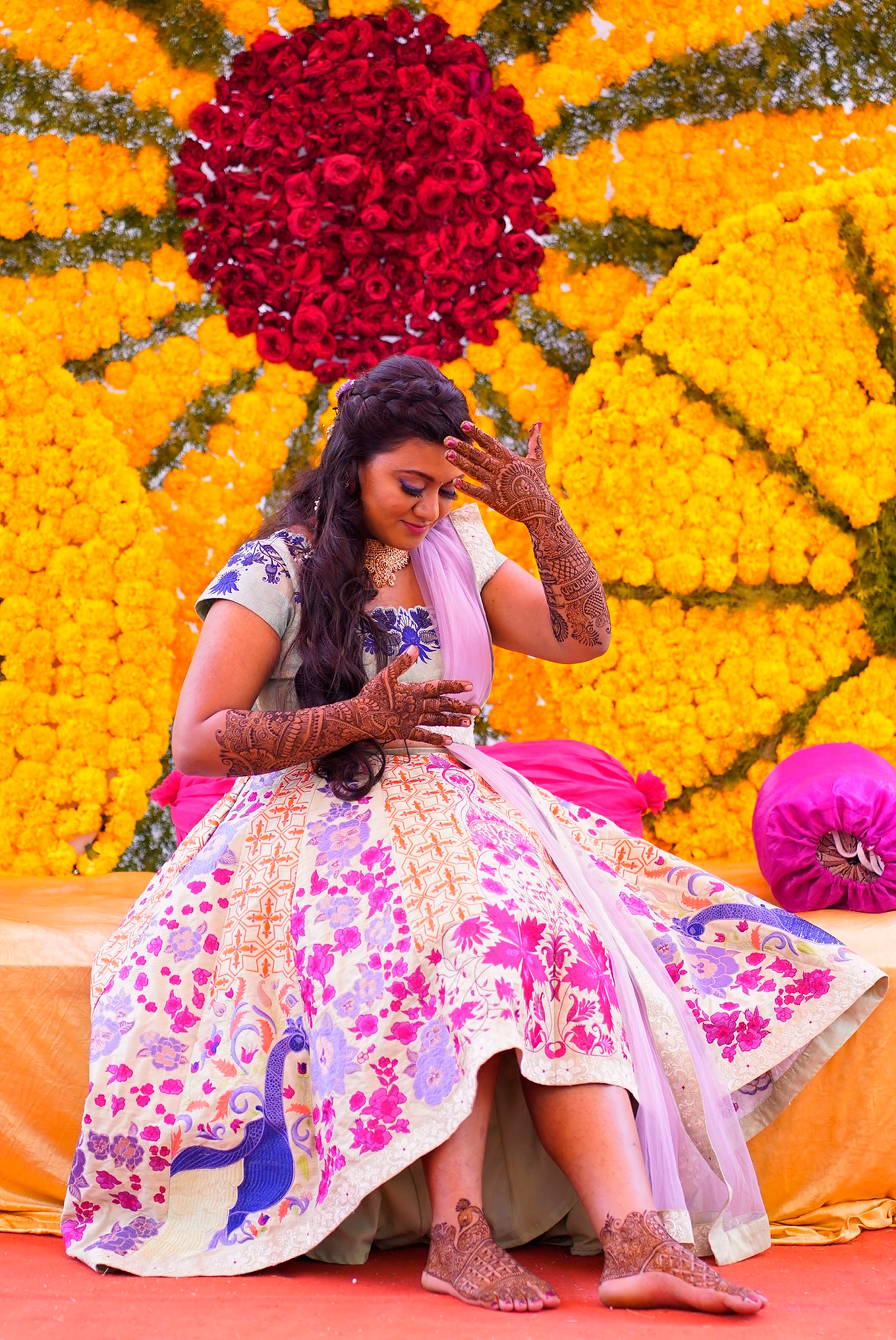 Bride Sowmya Rani from Hyderabad posing in a pastel pistachio green lehenga handcrafted by team Archana Karthick.