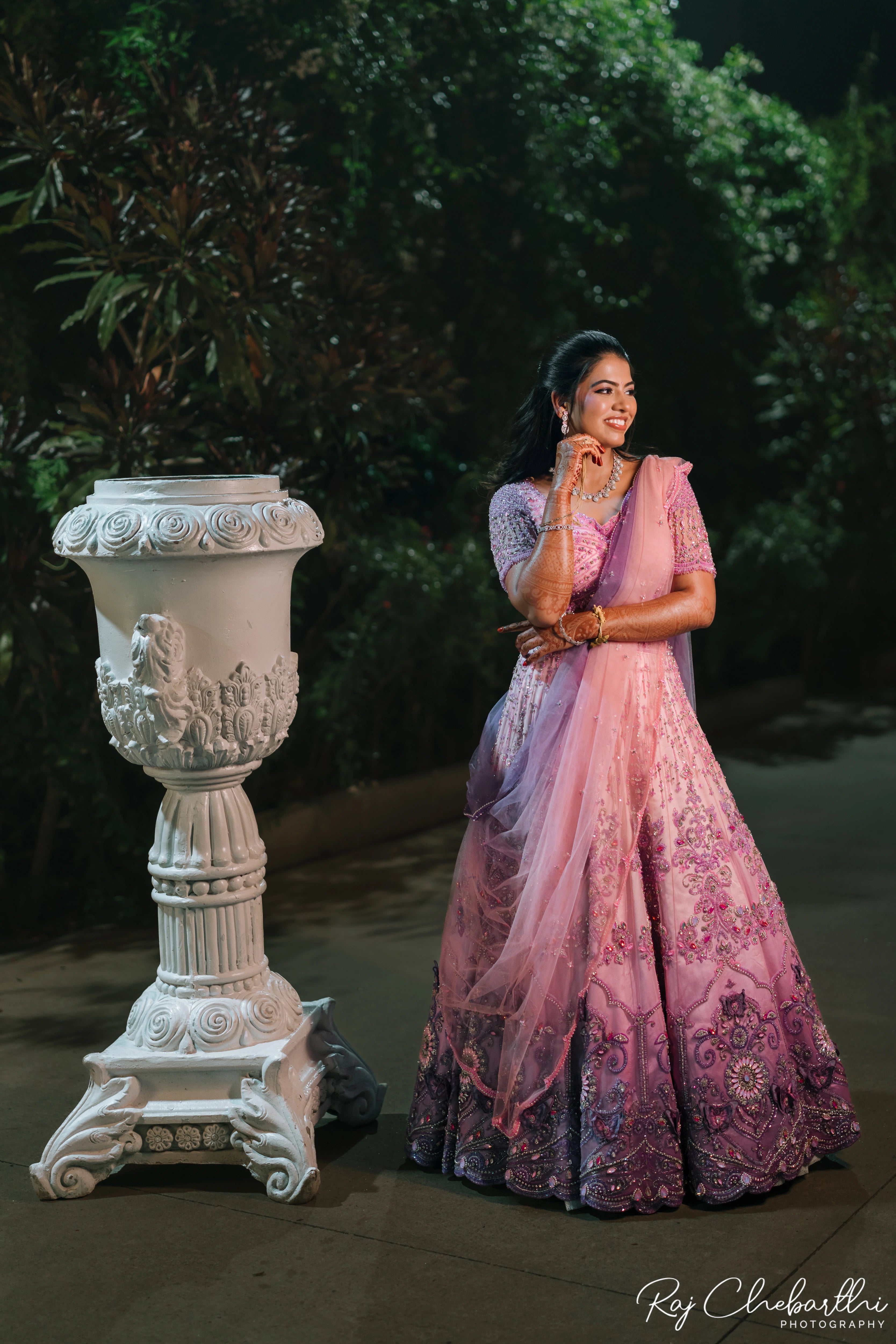 Bride Subhiksha from US in a lavender-pink lehenga by Archana Karthick