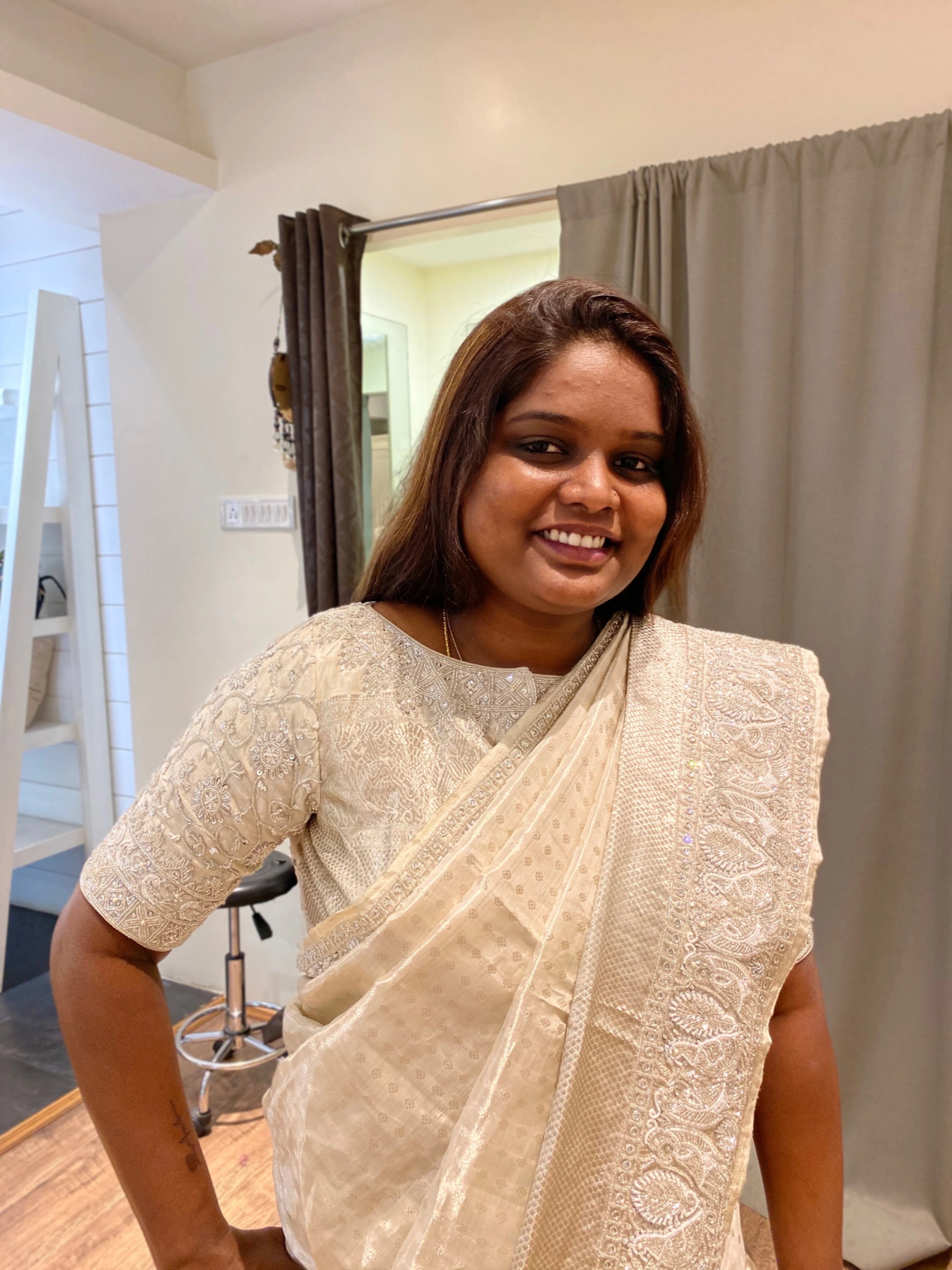 Bride Viniba from Chennai in an ivory and silver silk blouse and saree border handcrafted intricately with beads, stones, sequins, cutdana and zardozi.
