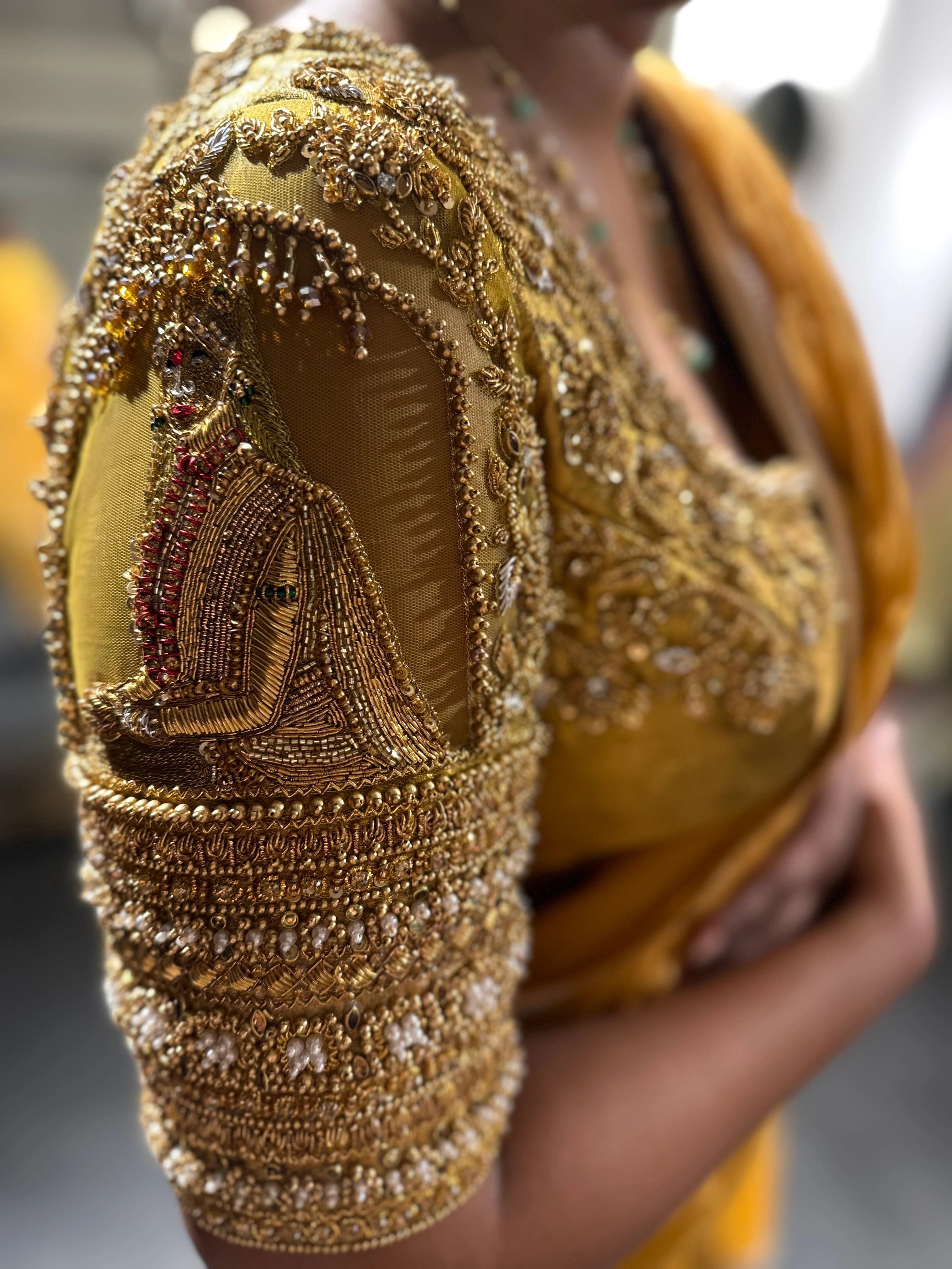 Bride Vishu Priya during her fittings at our studio in a gold silk blouse, handcrafted by team Archana Karthick.