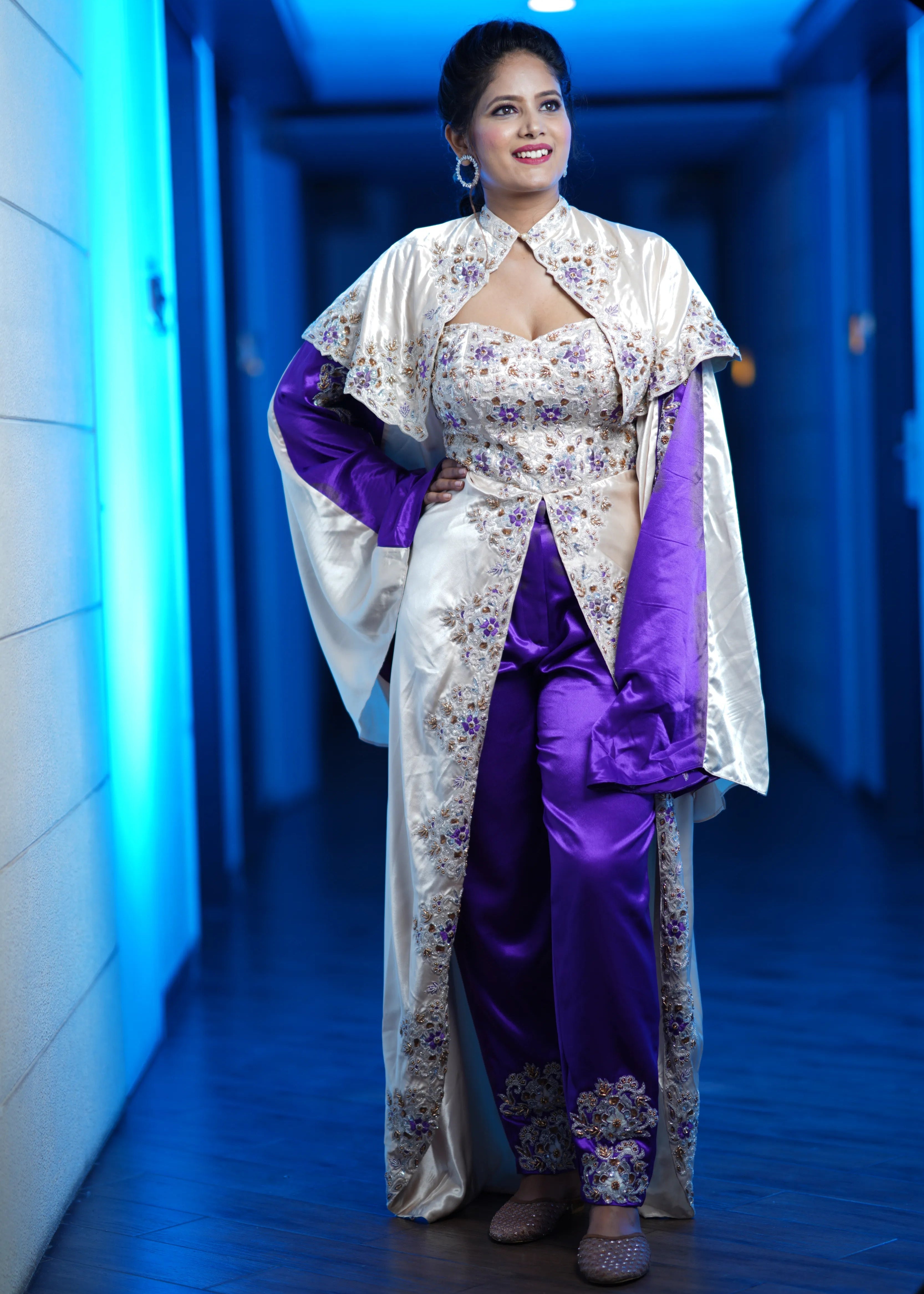 Bride in a handcrafted satin silk corset outfit (corset x masakali x kimono fusion) embellished with cut dana, sequins, beads and resham embellishments. This was designed for her sangeet party.