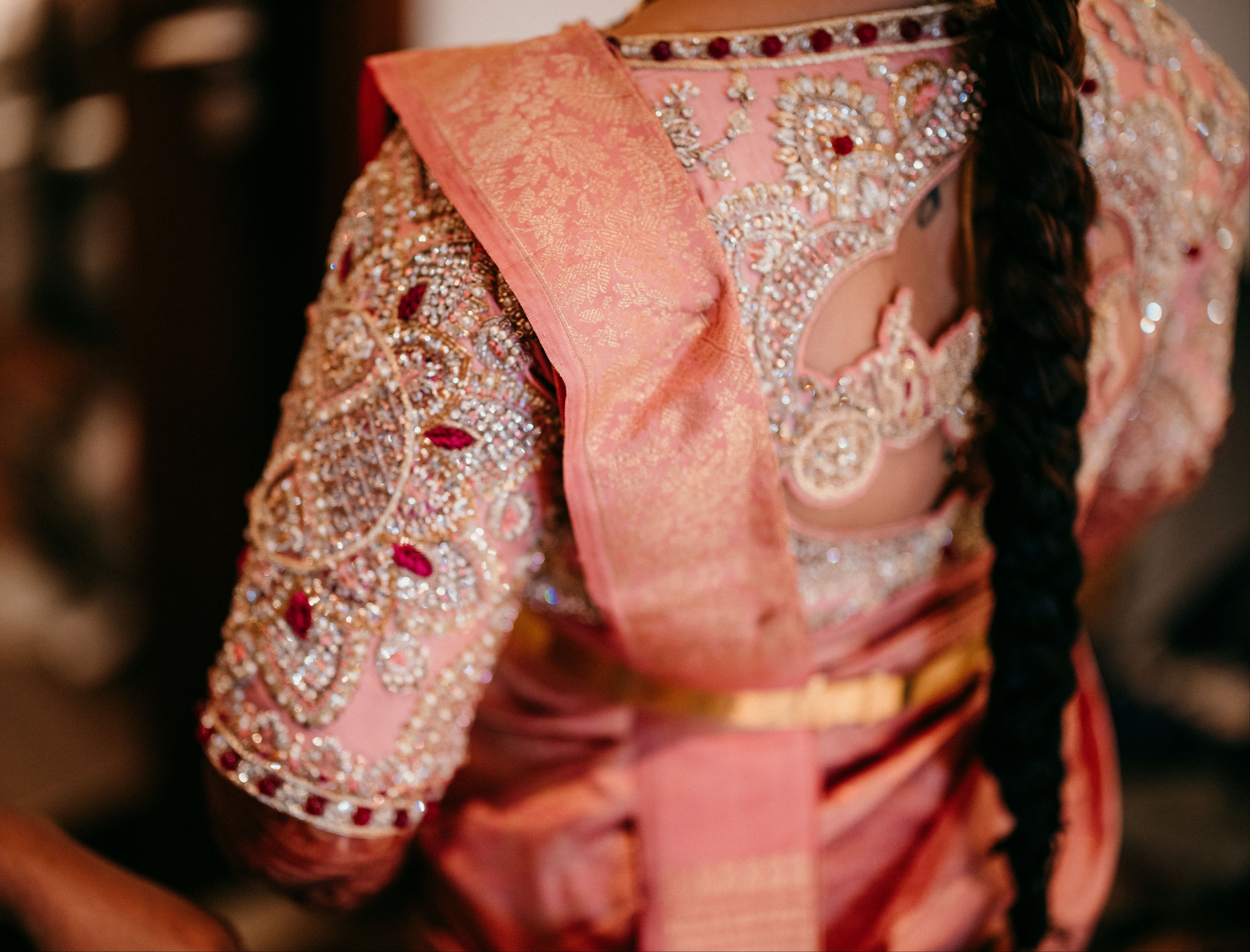Comedian and actress Vidyu Raman in a palanquin concept pink blouse handcrafted intricately with resham knot work, cut dana, crystal, pearls, swarovski stones and sequins designed by Archana Karthick.