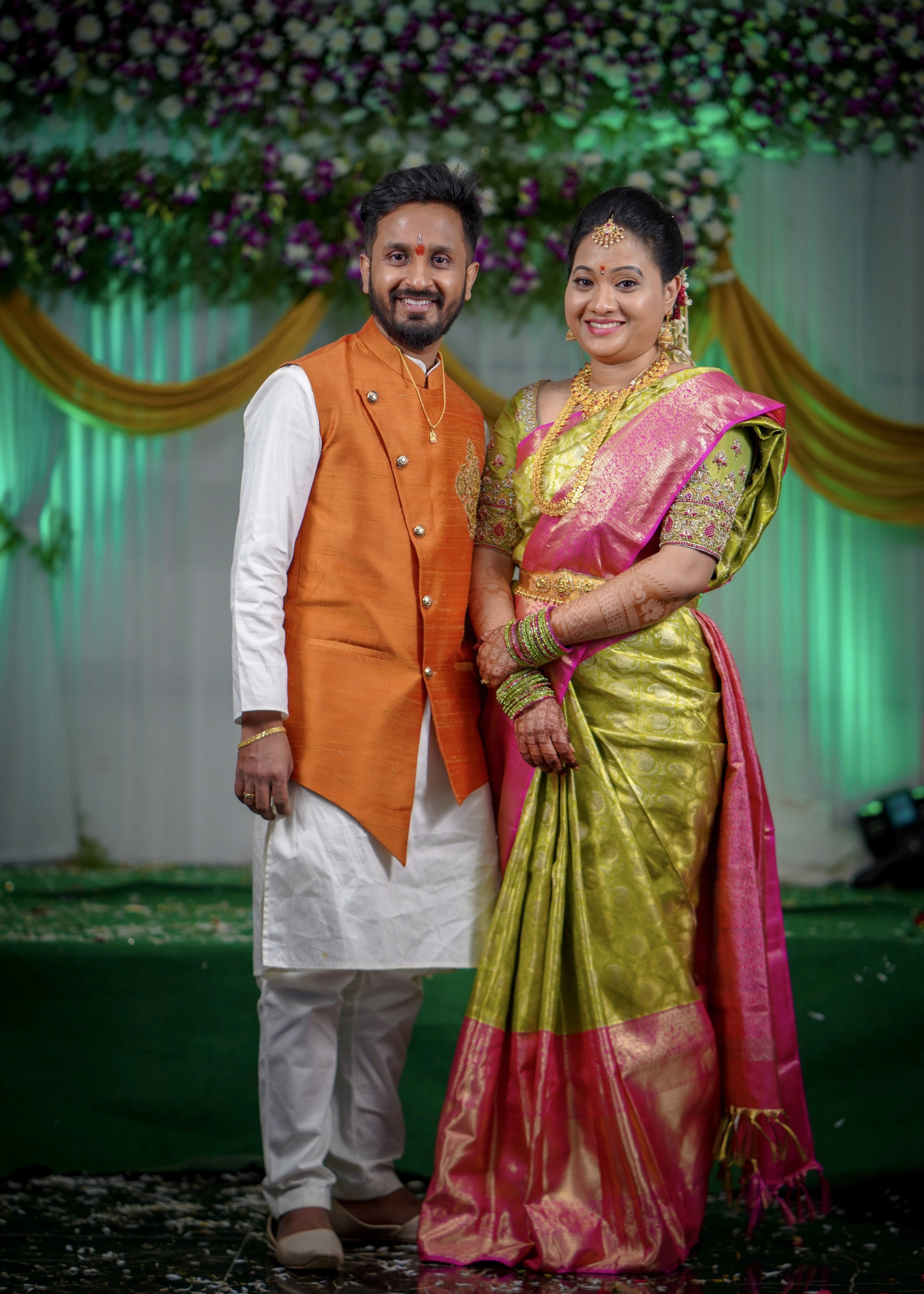 Handcrafted blouse for bride and bandhgala set for groom from Seattle, USA. Designed by Archana Karthick.
