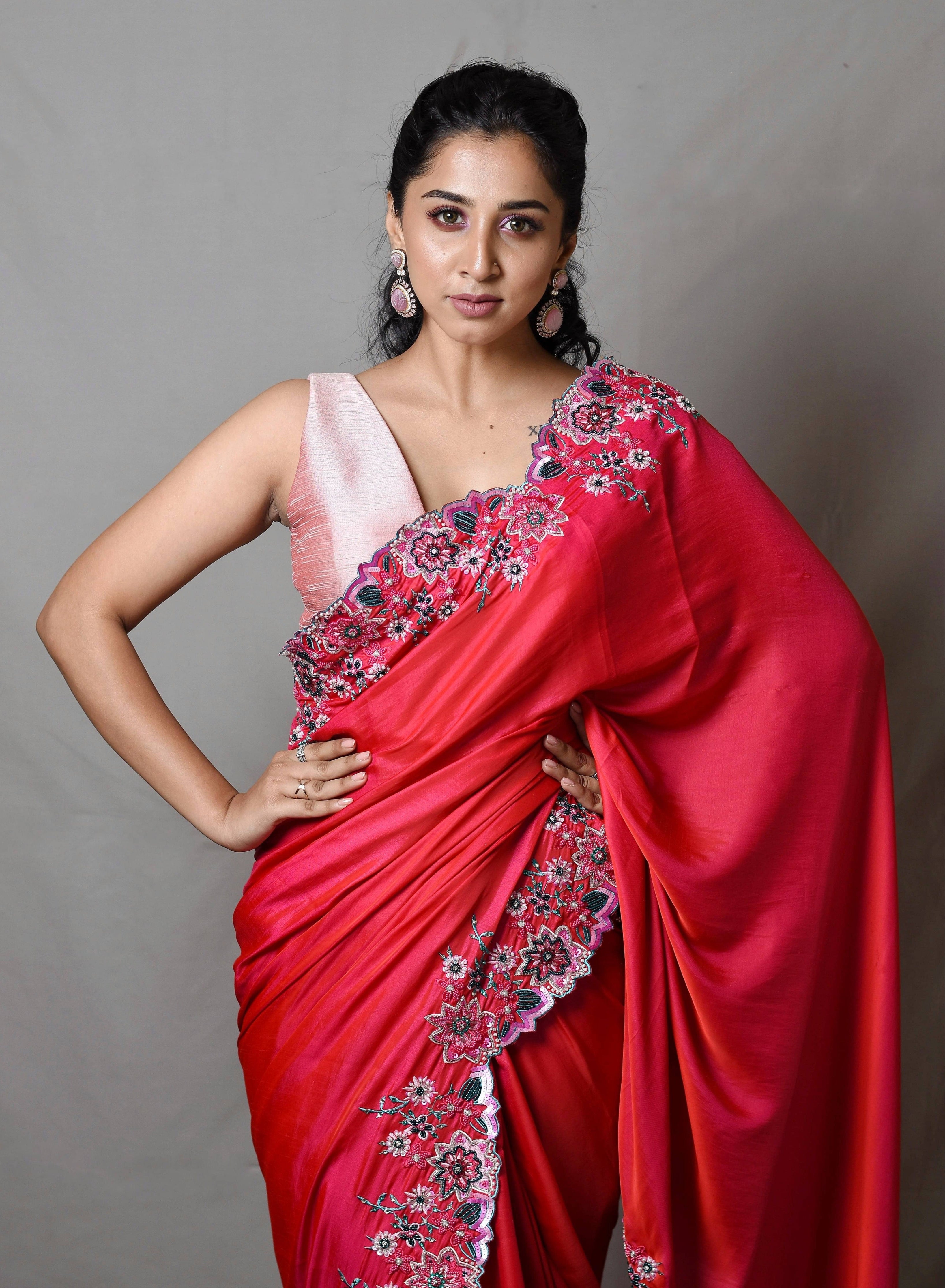 Influencer Deekshita Nikkam in a pink shimmer georgette saree paired with raw silk corset blouse designed by Archana Karthick.