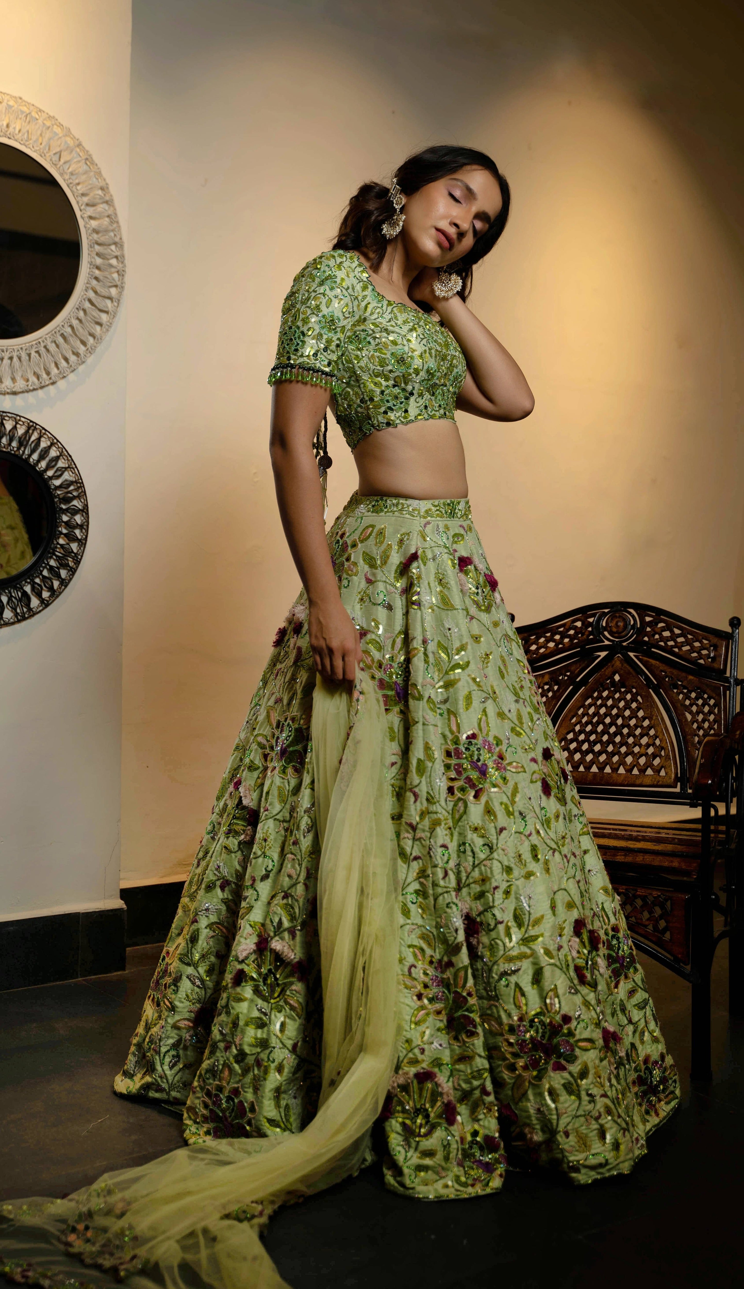 Influencer and actress Shweta Gai in a handcrafted green raw silk lehenga with floral motifs by Archana Karthick.