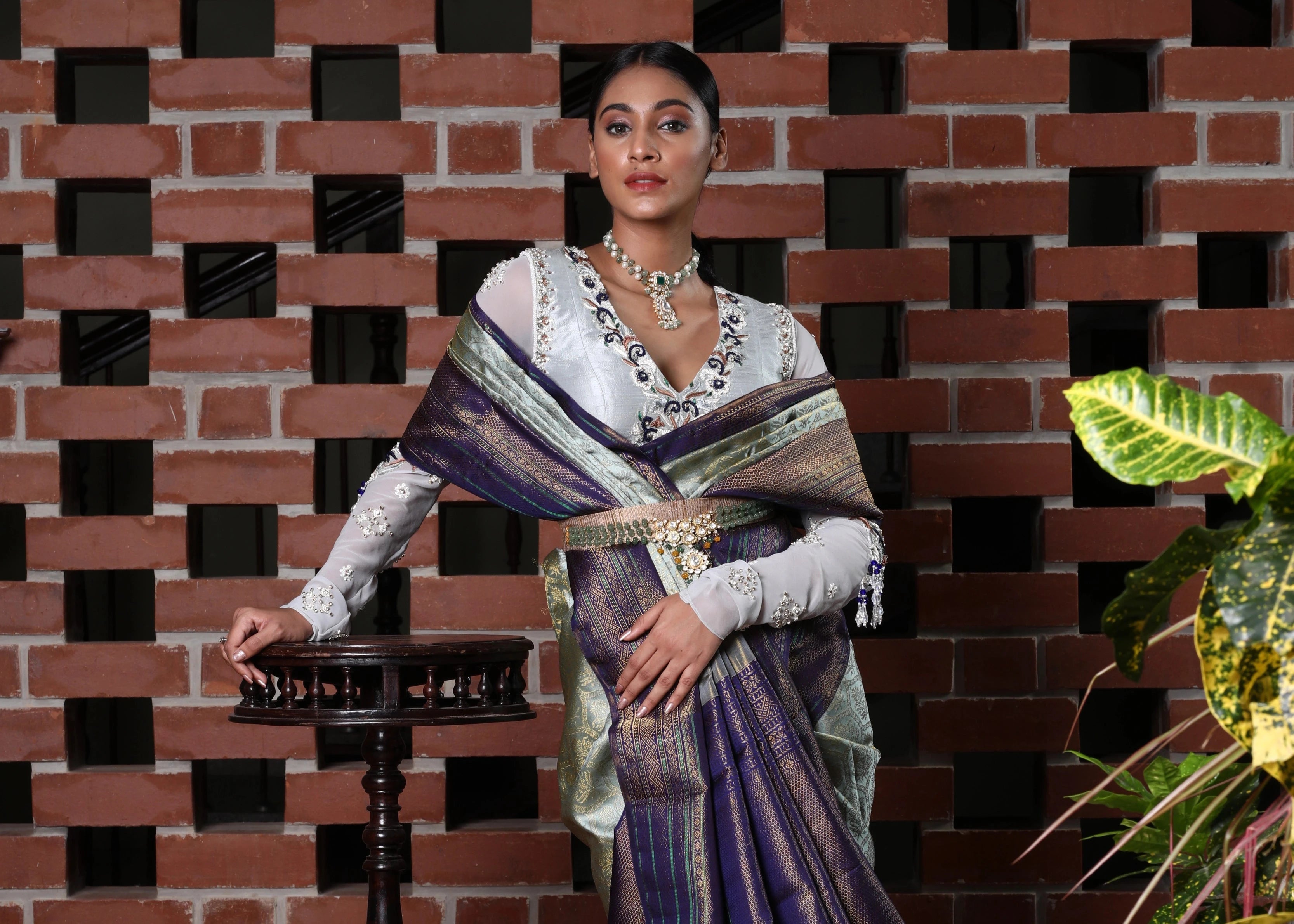 Miss India and Actress Anukreethy Vas in a raw silk and georgette backless blouse, intricately handcrafted by team Archana Karthick.