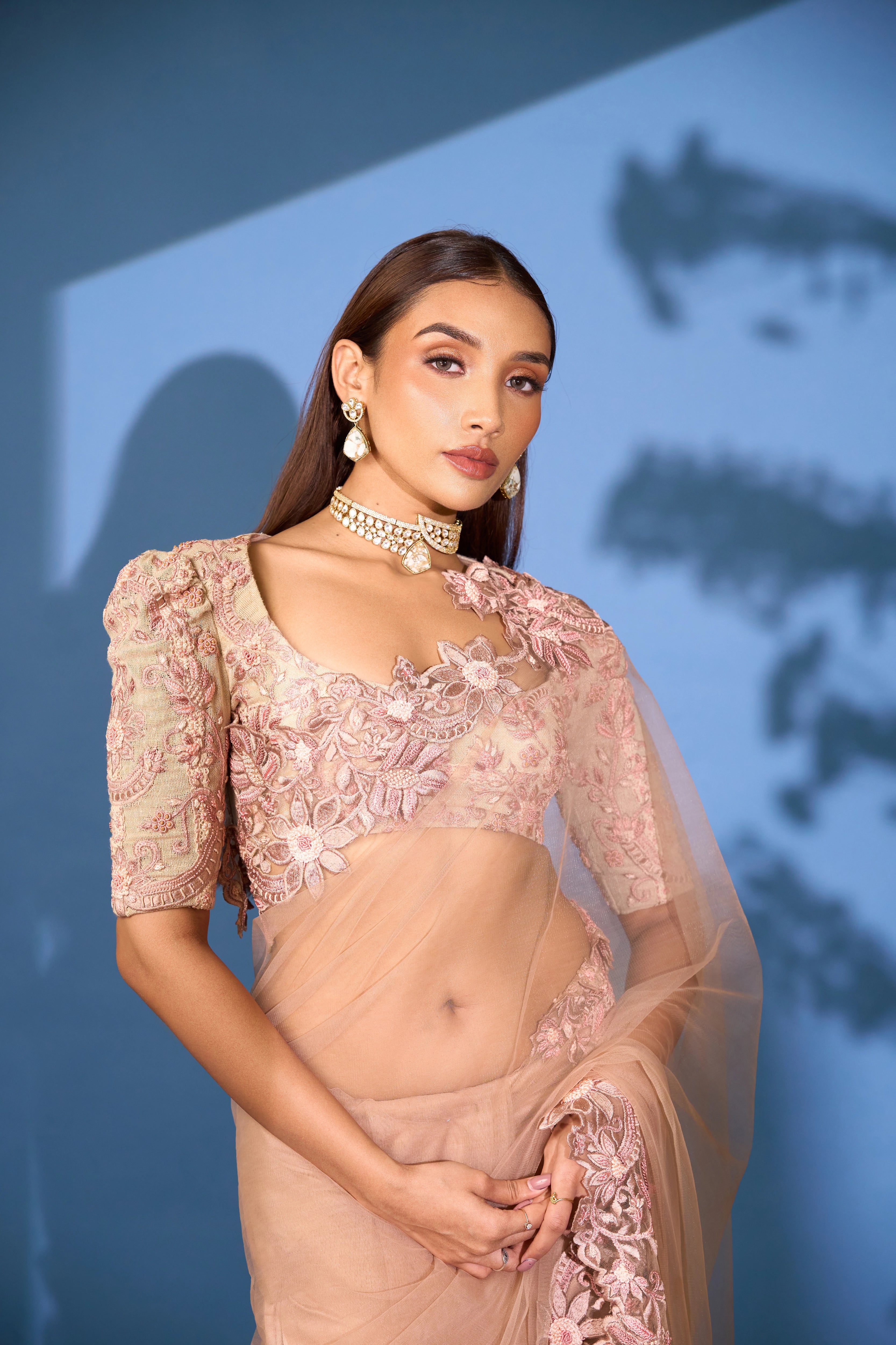 Model Shreya Bhat stuns in a net saree & jute blouse in blush pink. Perfect bridal & party look.