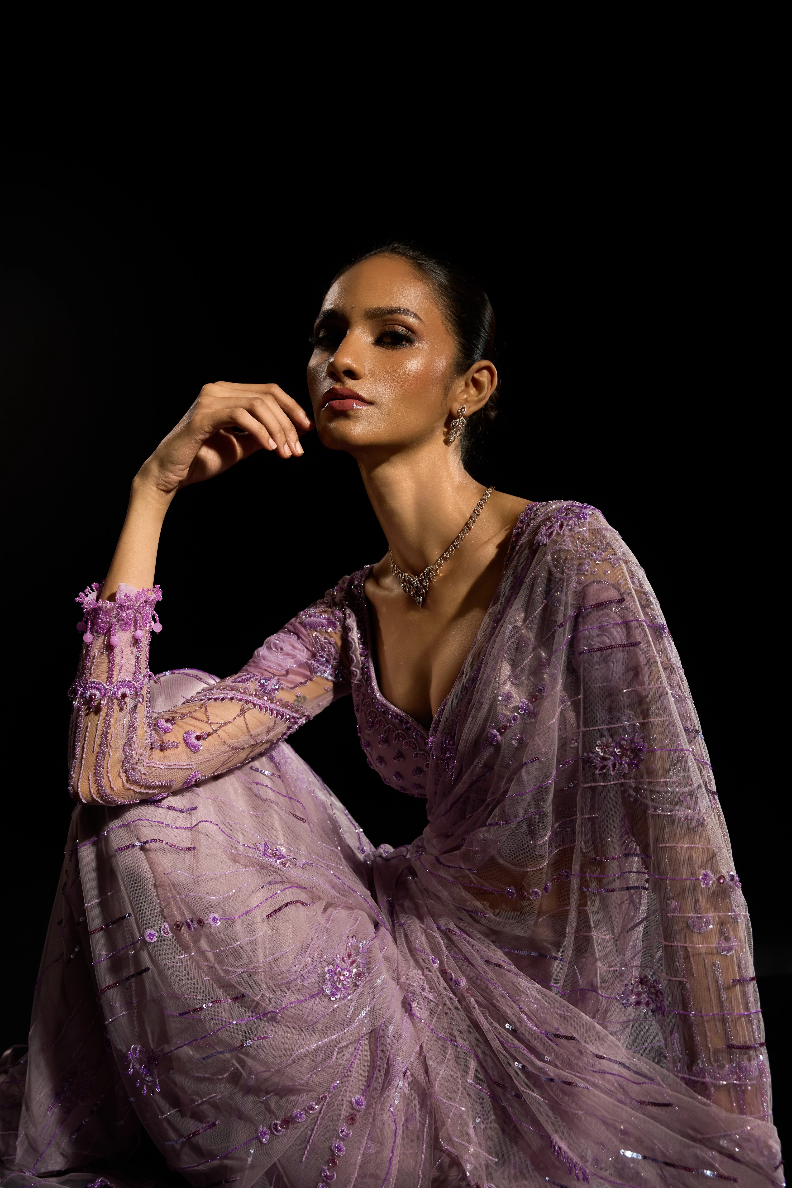 Model Esha Gohil in a lavender saree set intricately adorned with sequins, rhinestones, crystals and cutdana for "STARDUST" - A/W'25 saree collection by team Archana Karthick.
