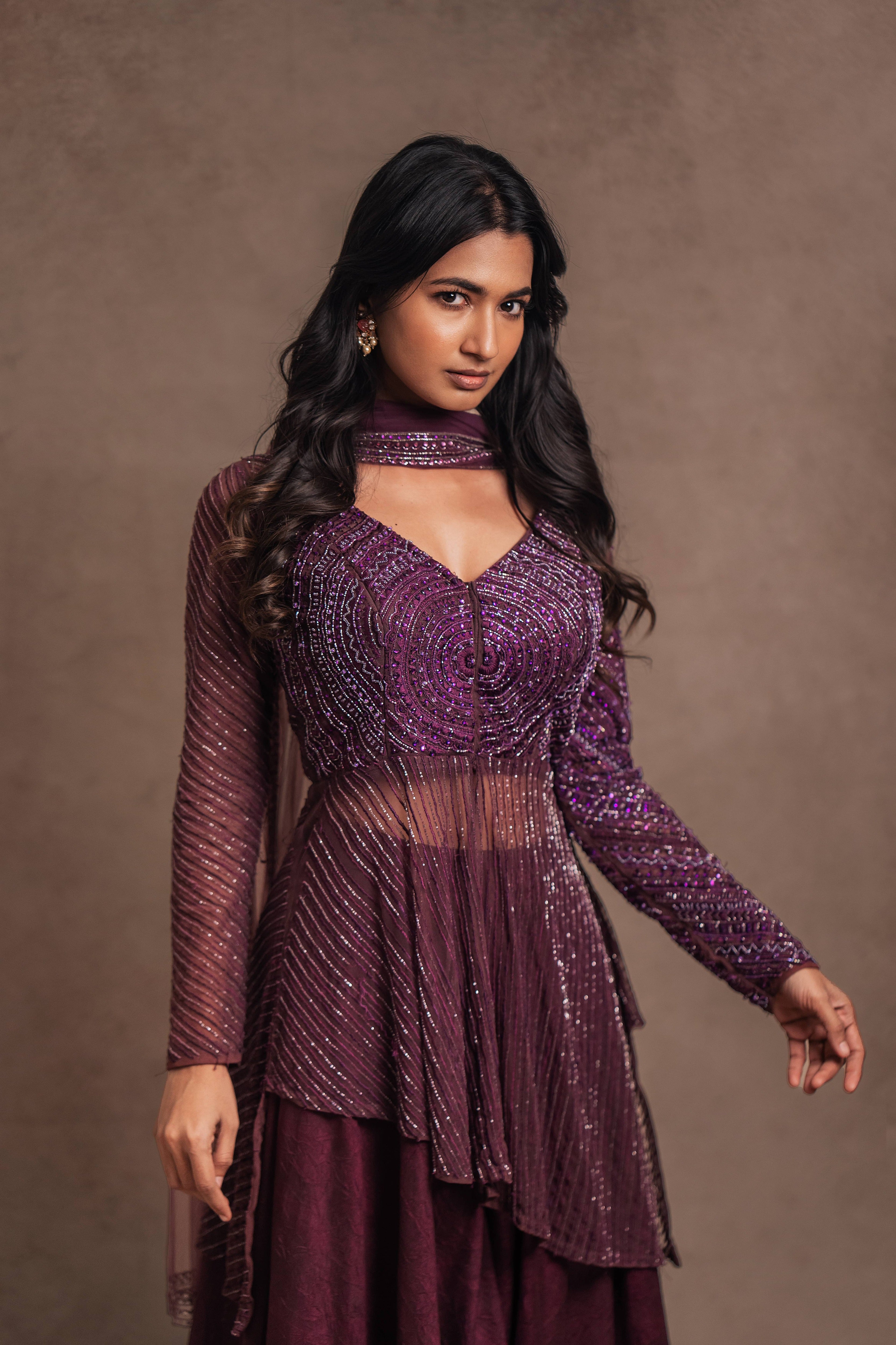 Model Premika Sekar in aubergine peplum sharara