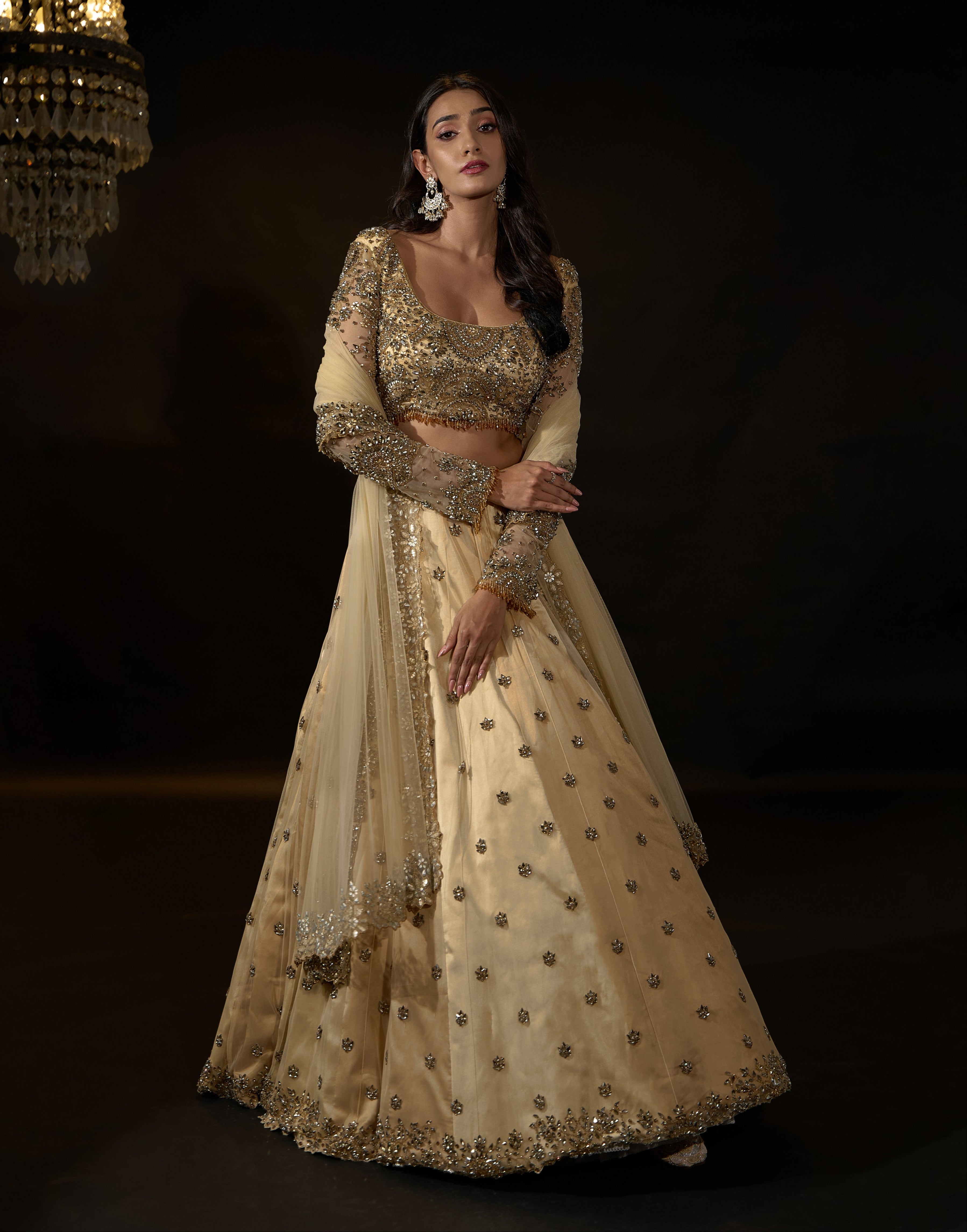 Model Rheyea in a golden beige lehnega by Archana Karthick