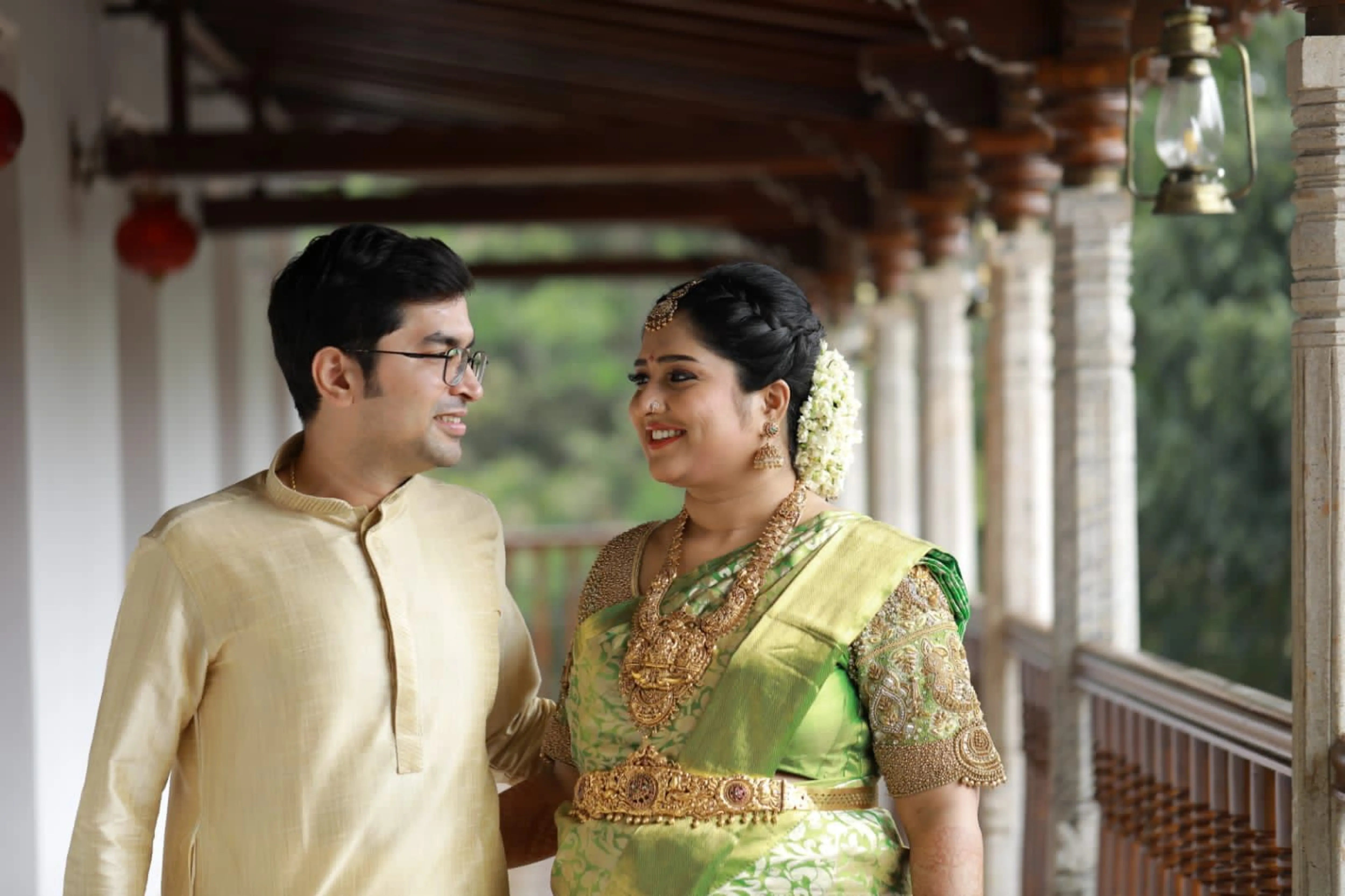 Mother to be, Dr Nivetha from Bangalore, posing in a green silk blouse handcrafted by team Archana Karthick.
