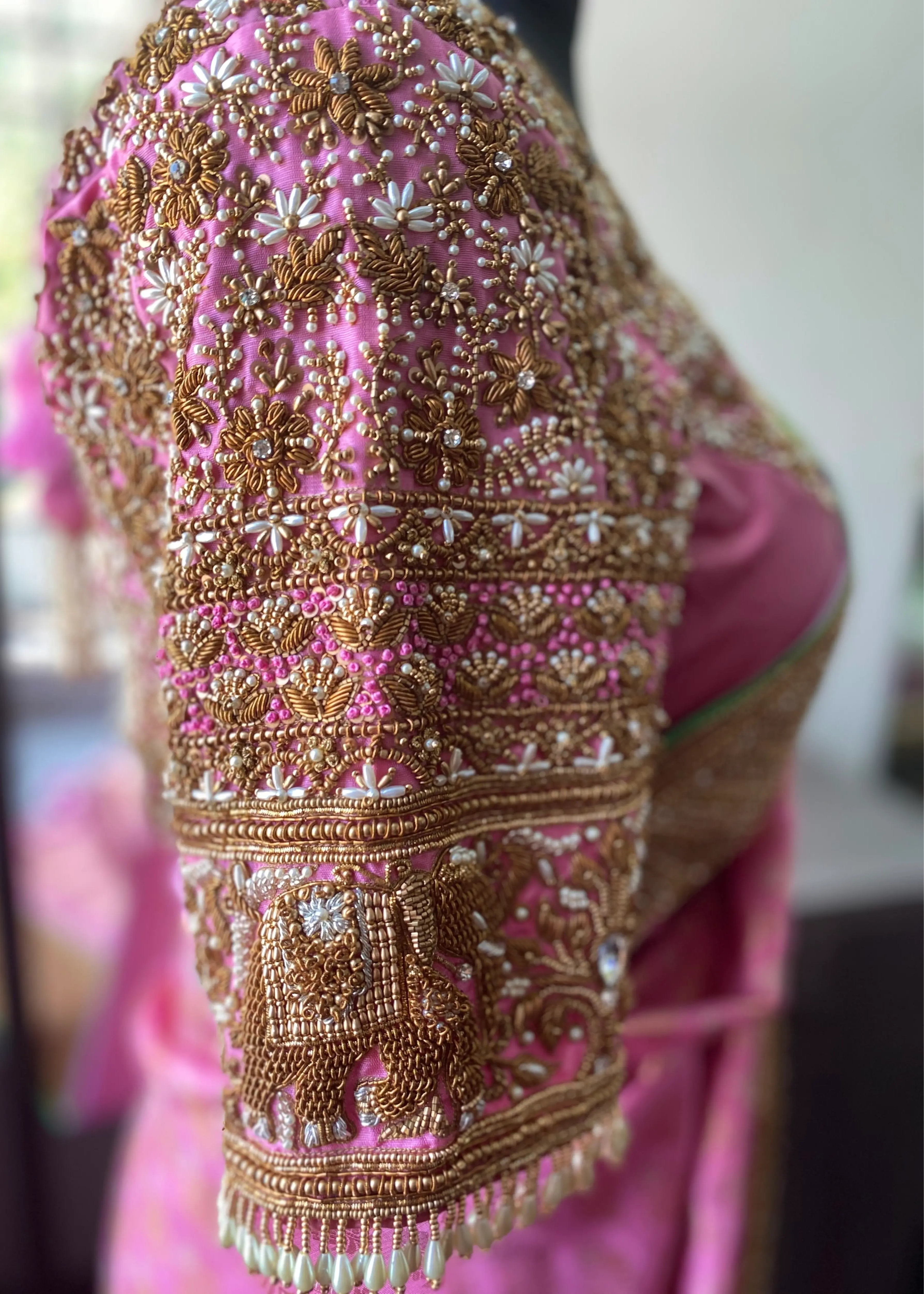 Saree border and blouse designed by Archana Karthick with zardozi and pearls for bride Sathiyapriya from Dindigul. At the atelier blouse sleeves detailing