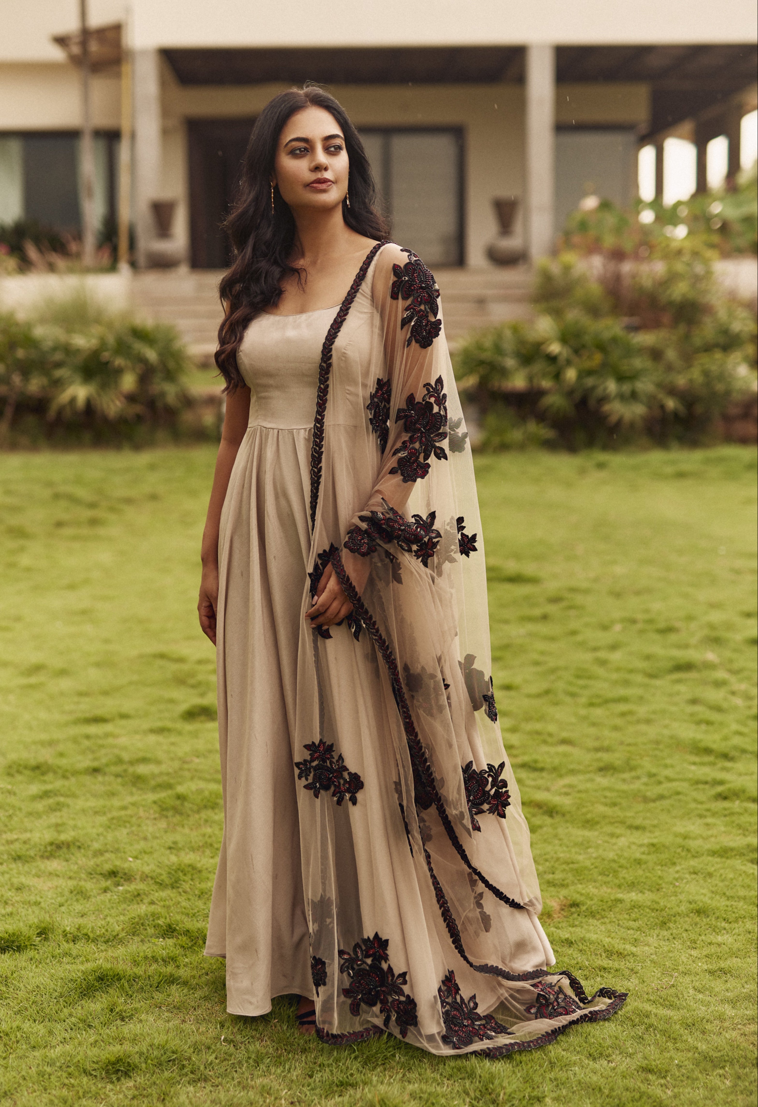 Actor Bindu Madhavi in a handcrafted satin georgette anarkali with embellished net dupatta by designer Archana Karthick