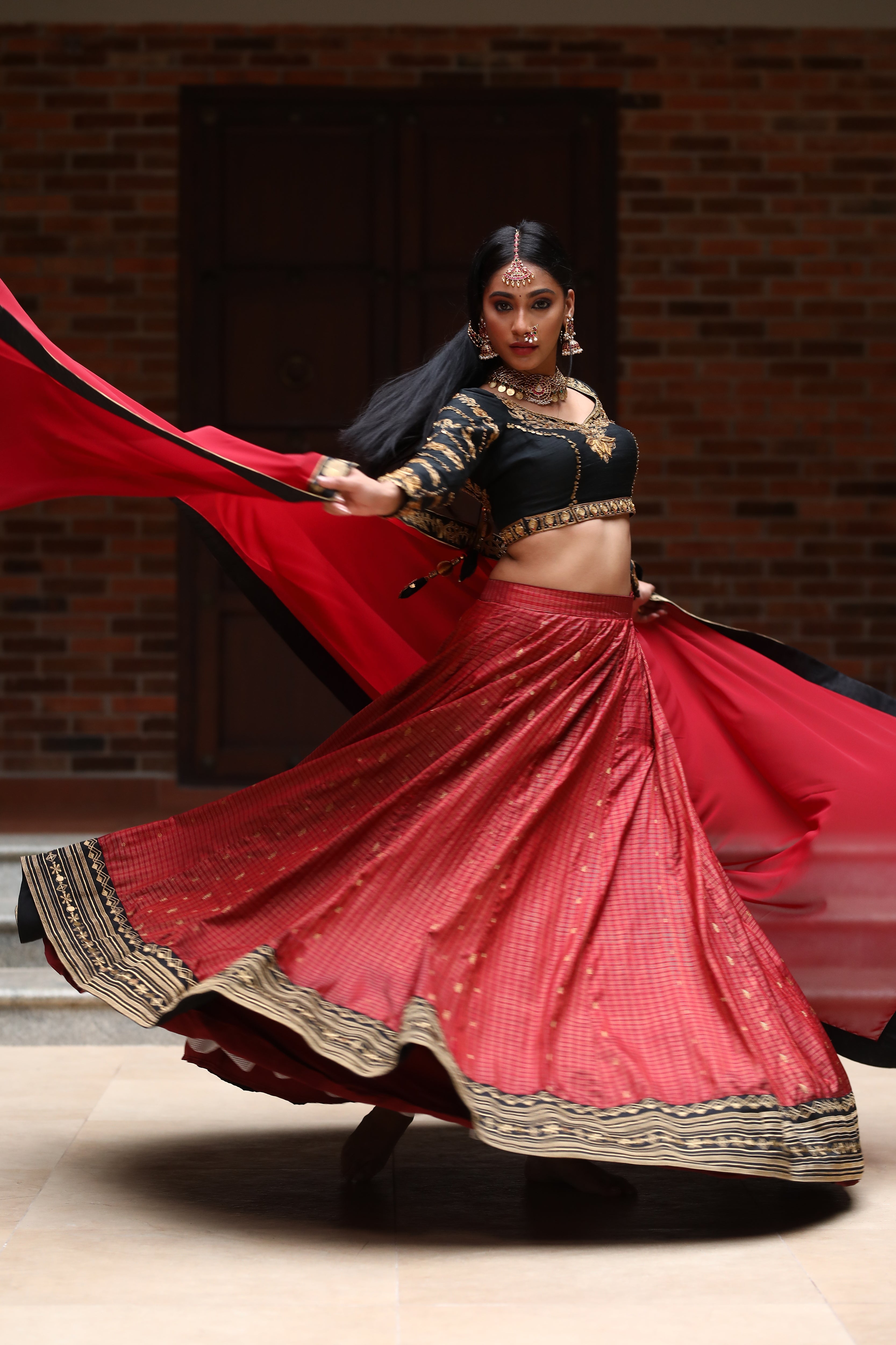 miss india 2018 and actress Anukreethy Vas in lehenga designed by archana karthick posing mid twirl full front