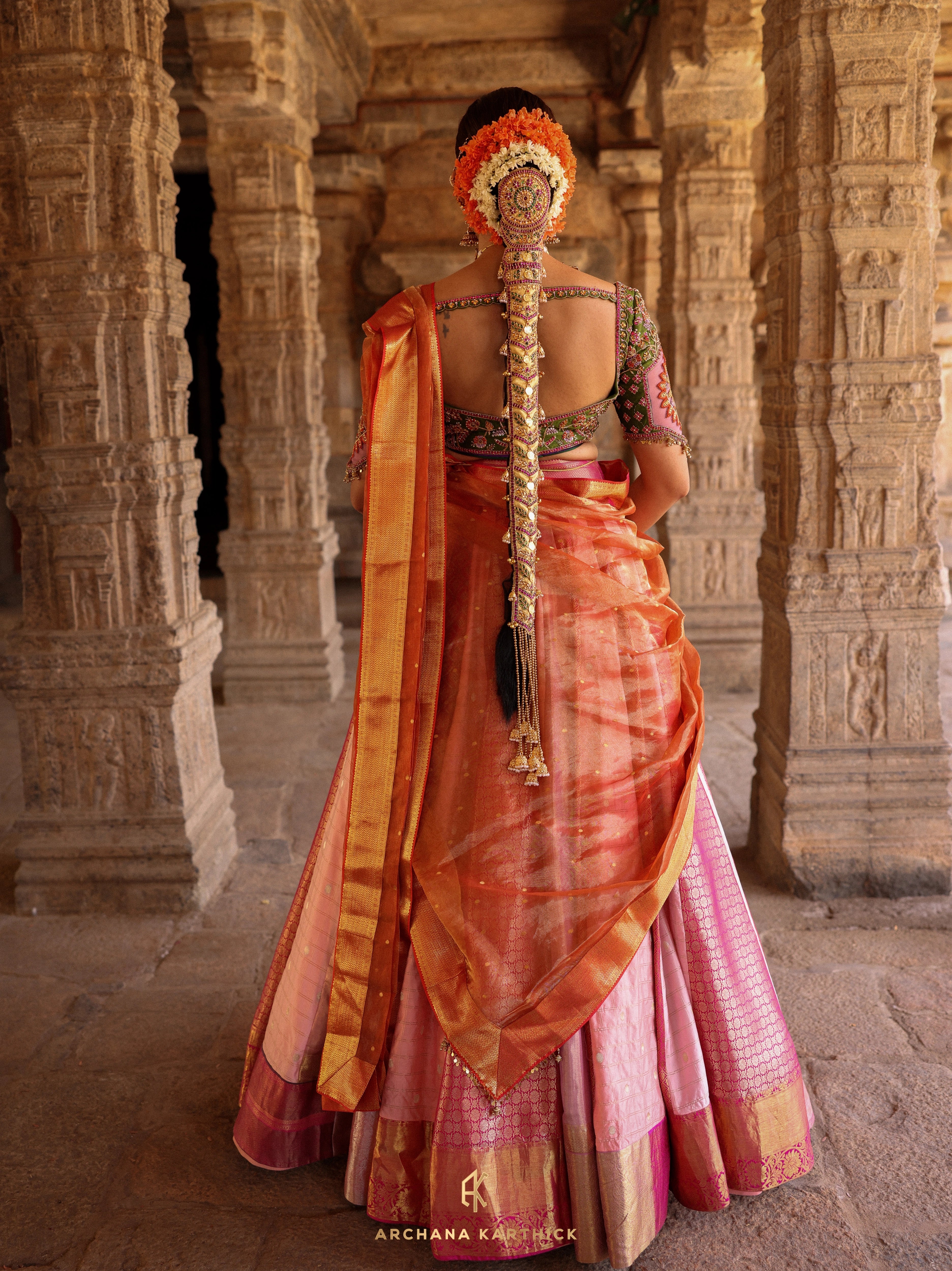 "Kundhavai" - Pink, Orange & Green Kanjeevaram Tissue Silk Half Saree