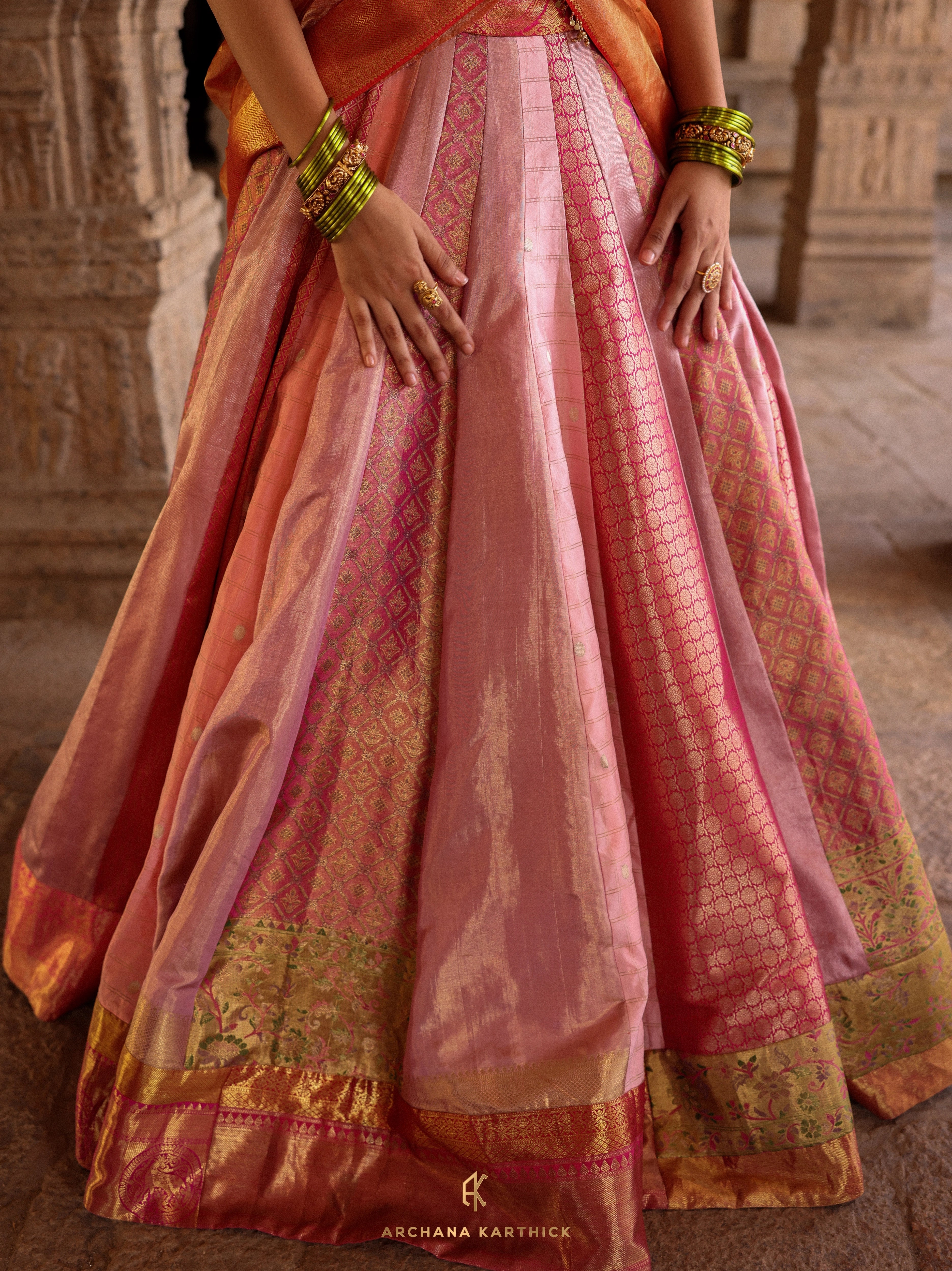 "Kundhavai" - Pink, Orange & Green Kanjeevaram Tissue Silk Half Saree