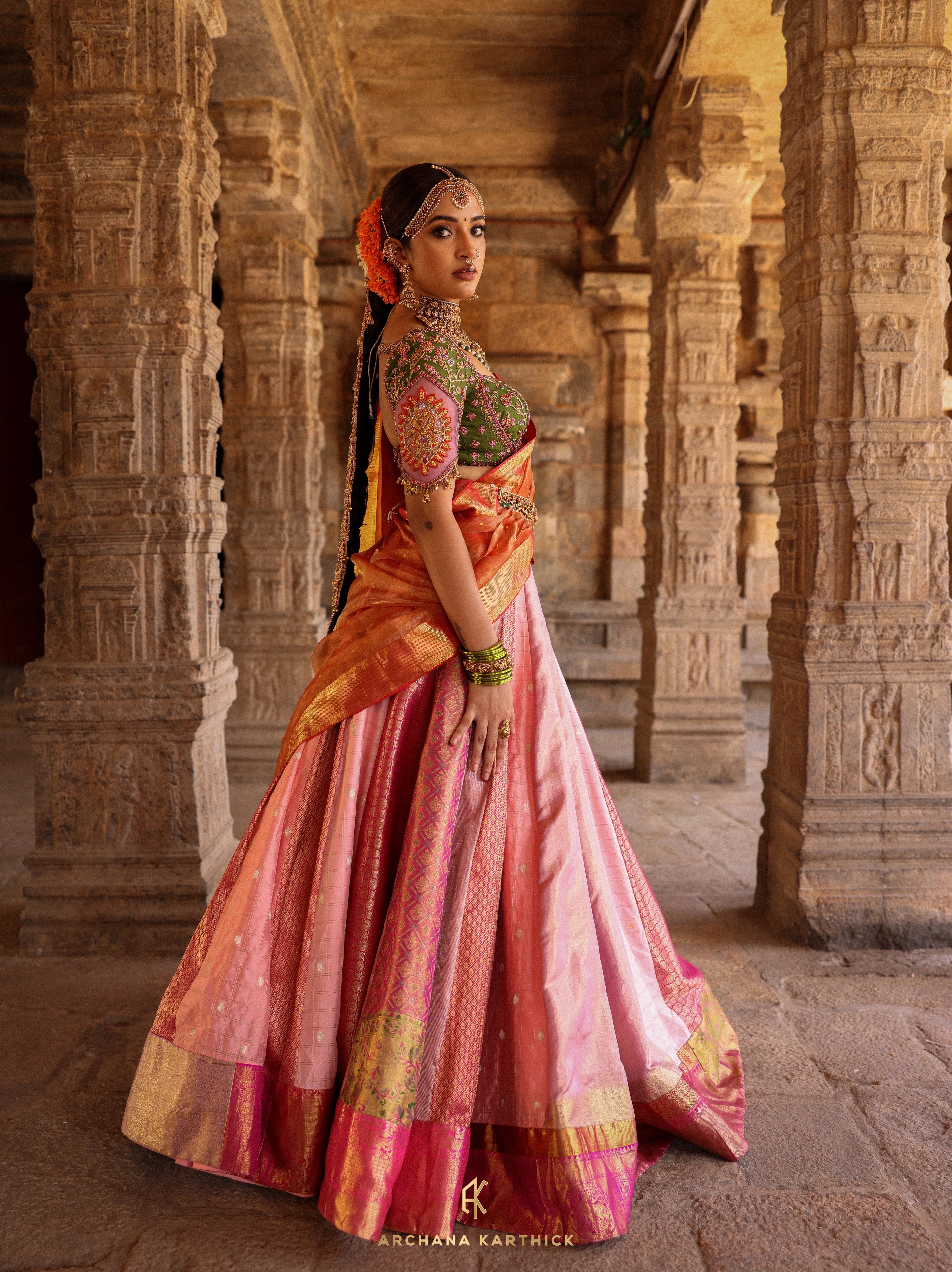 "Kundhavai" - Pink, Orange & Green Kanjeevaram Tissue Silk Half Saree