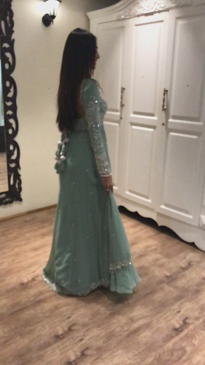 Miss India and actress Anukreethy Vas twirling in a muted blue aquamarine georgette masakali lehenga. Intricately handcrafted with crystals, etc by team Archana Karthick.