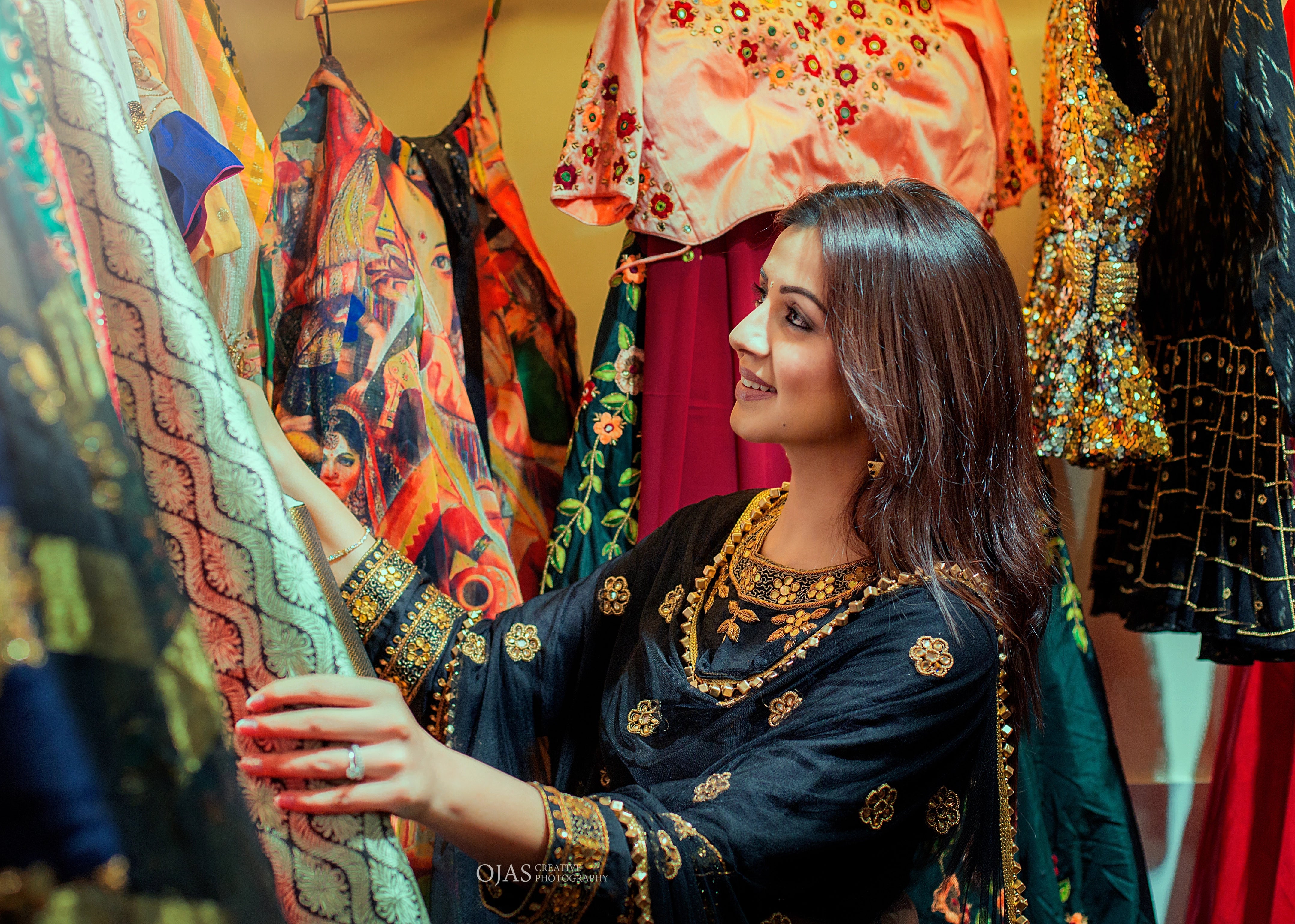 Actress Nikki Galrani posing in a lehenga designed by Archana Karthick with gota, mirror, cutdana, zardozi and metallic cubes on the border of the tulle dupatta.