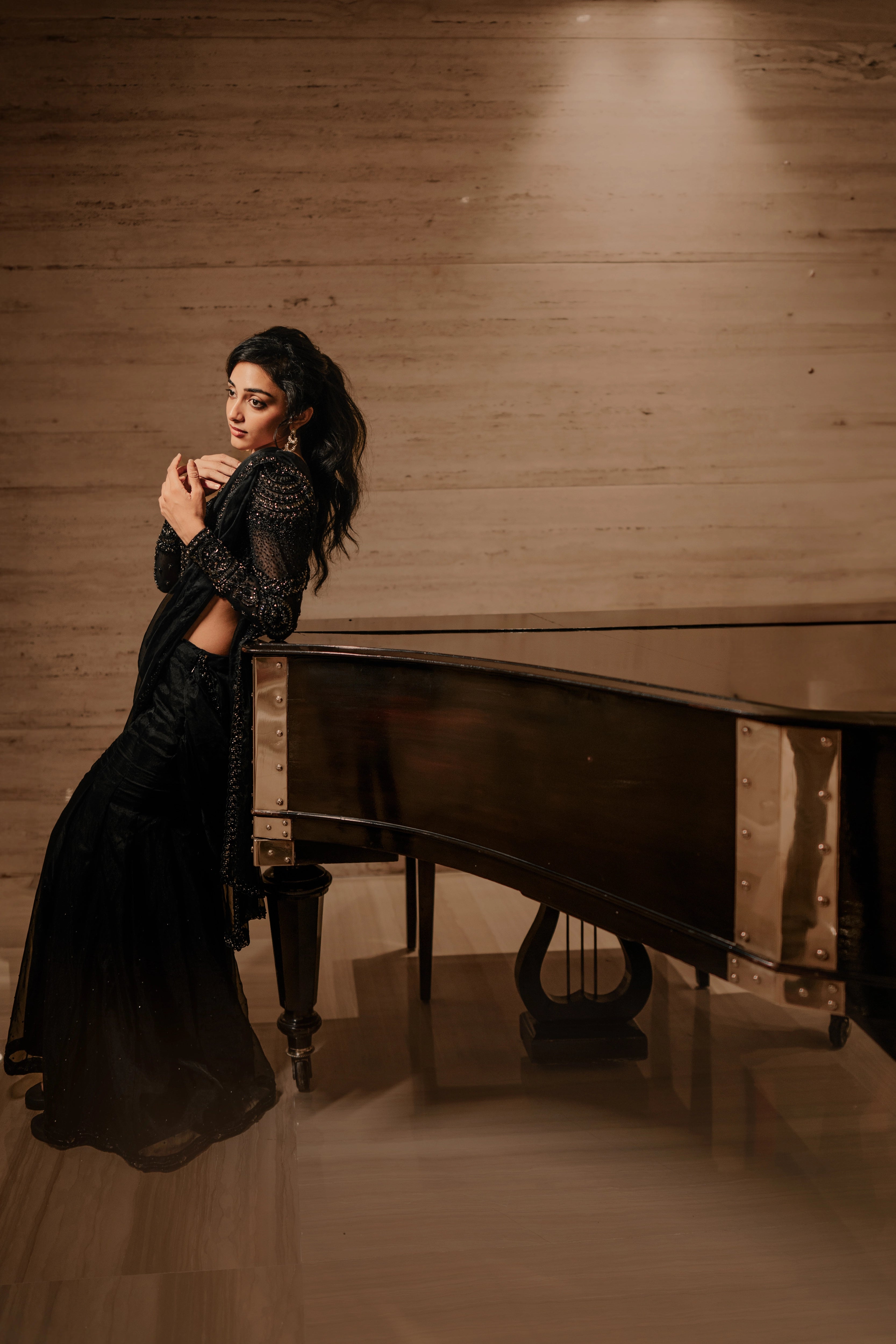 Actress & dancer Preity Mukhundhan during photoshoot in "The Black Mermaid" black mermaid lehenga saree from Archana Karthick's collection.