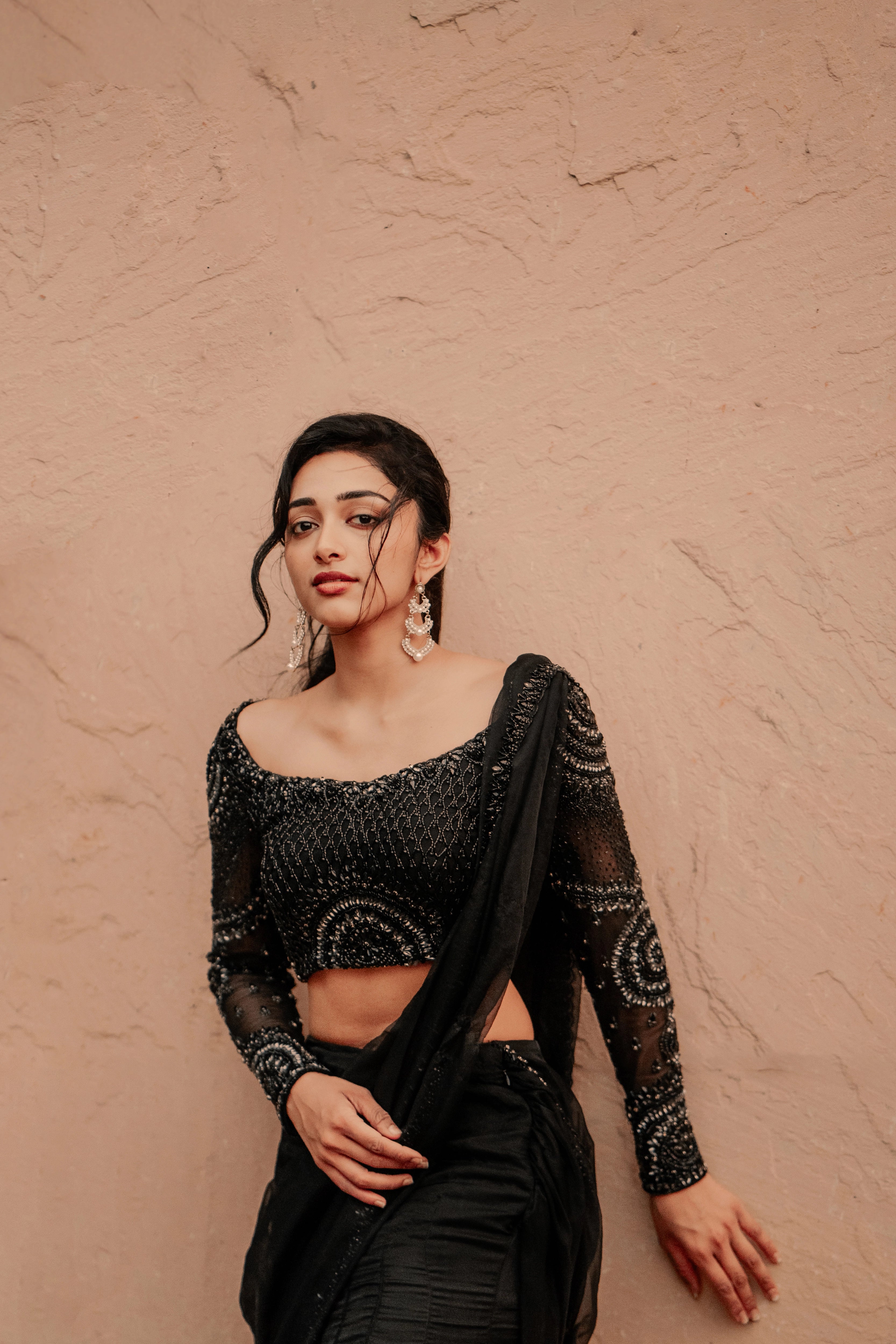 Actress & dancer Preity Mukhundhan in "The Black Mermaid" black mermaid lehenga saree from Archana Karthick's collection.