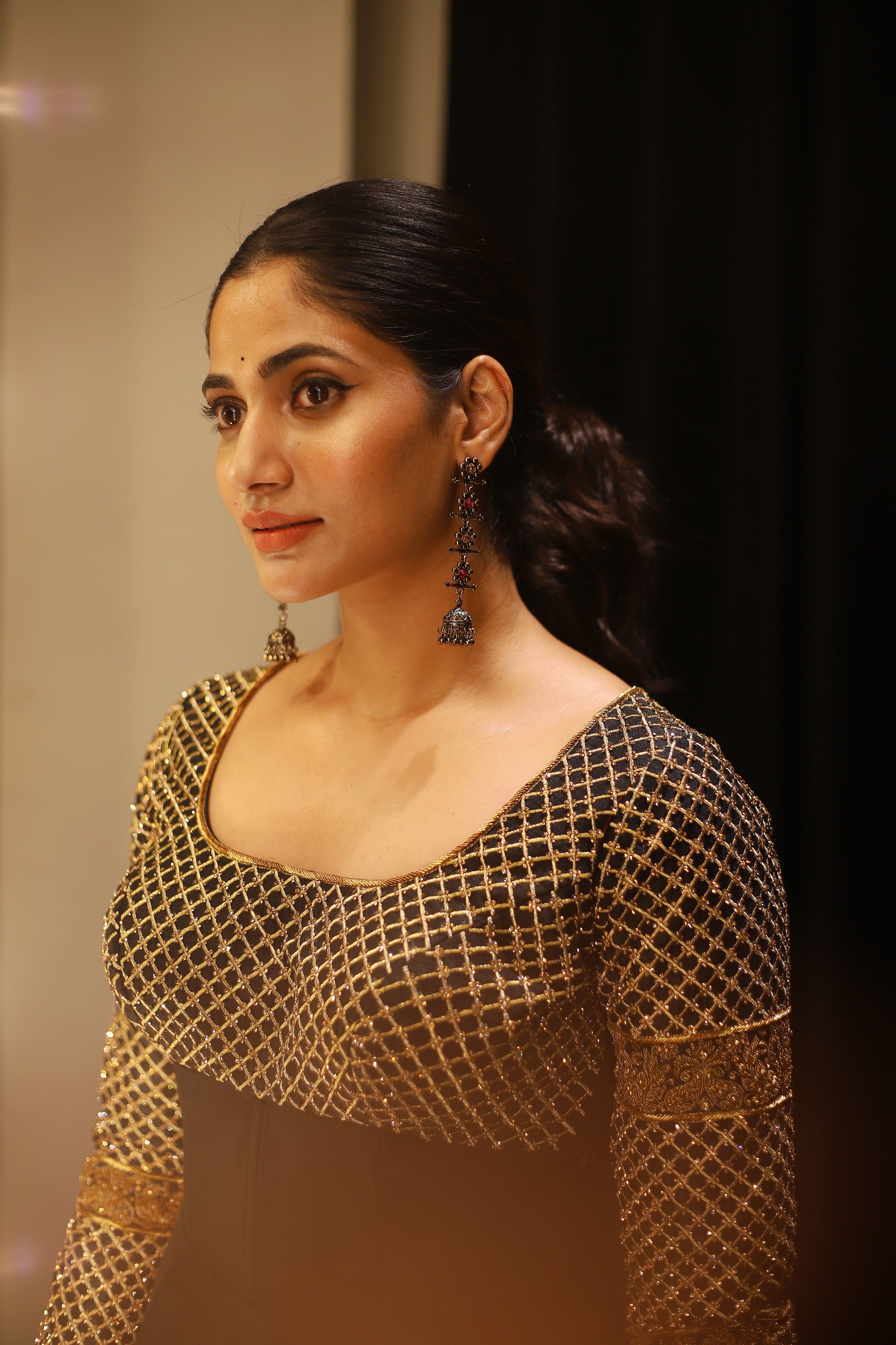 Bigg Boss fame and Actress Losliya Mariyanesan in Black Designer Anarkali by Archana Karthick looking away from the camera