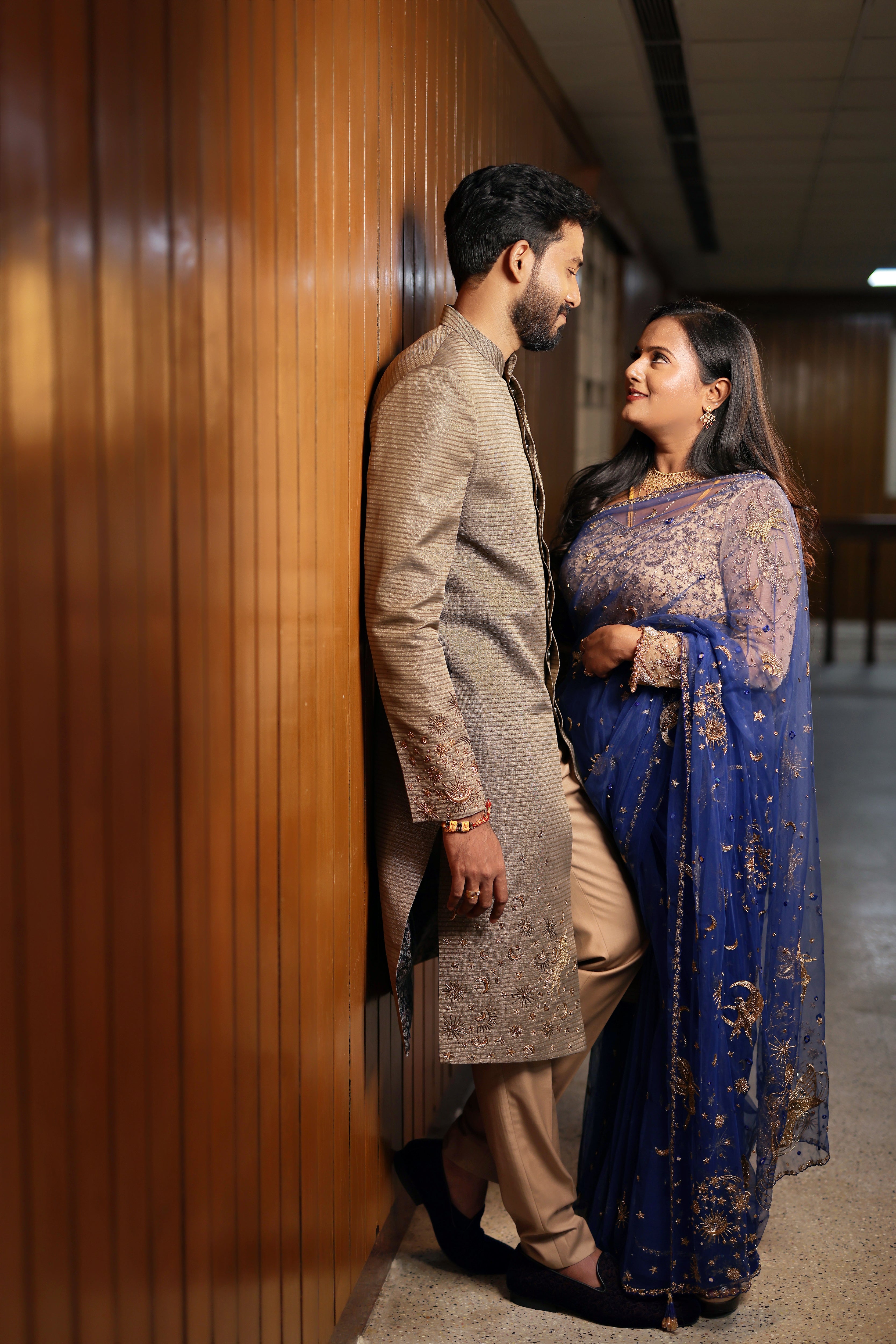 Bride Amirtha in a midnight blue tulle saree by team Archana Karthick.