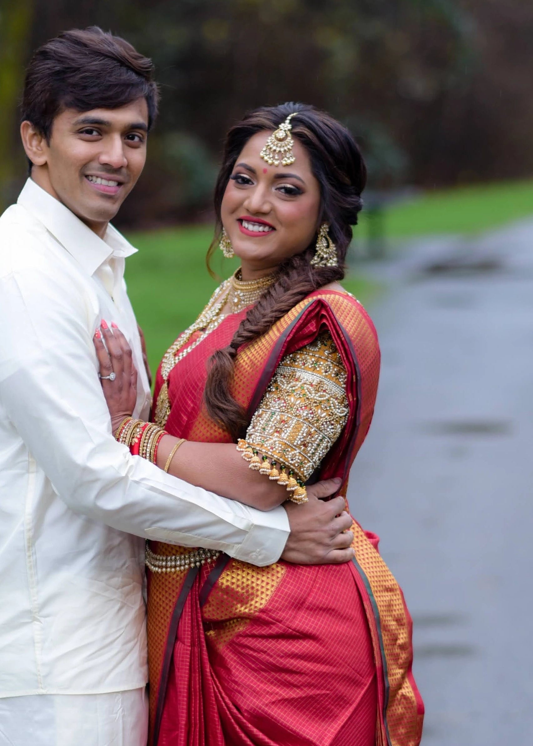 Bride Angeline from Canada posing in a gold silk blouse handcrafted by team Archana Karthick.