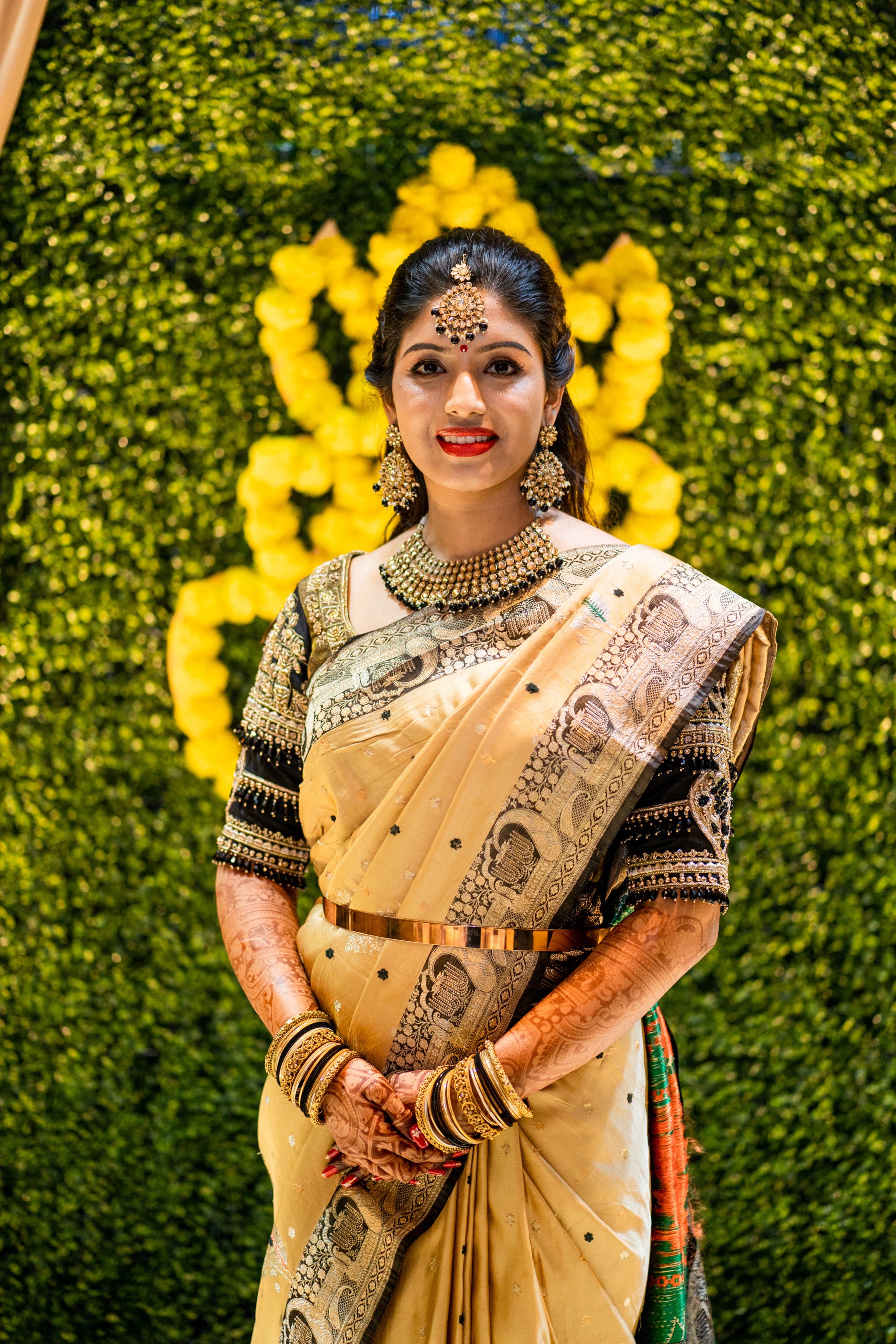 Bride Anusha from Malaysia in a black raw silk blouse by team Archana Karthick