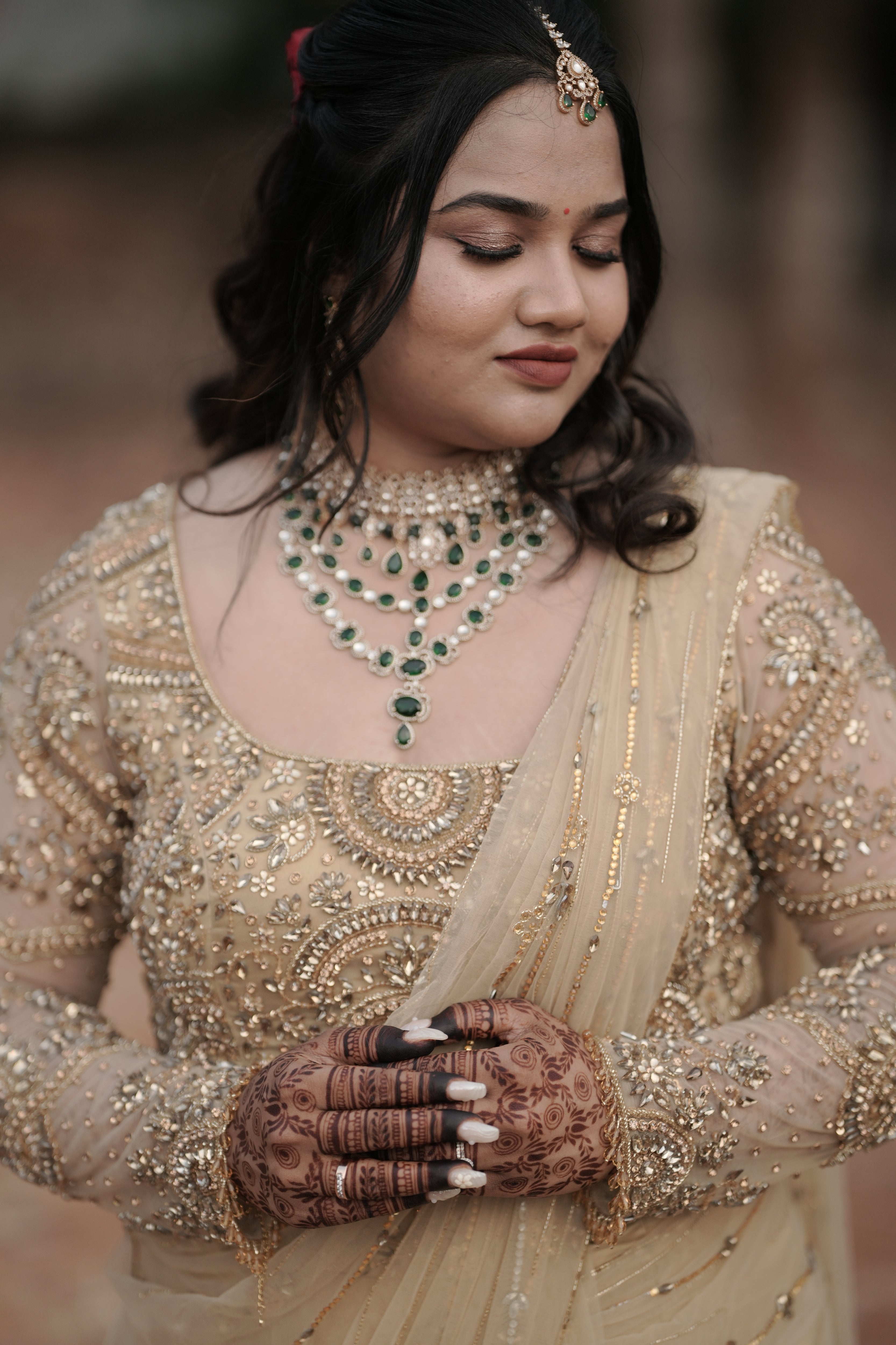 Bride Chithira from Australia, for photoshoot in a golden tulle saree by team Archana Karthick.