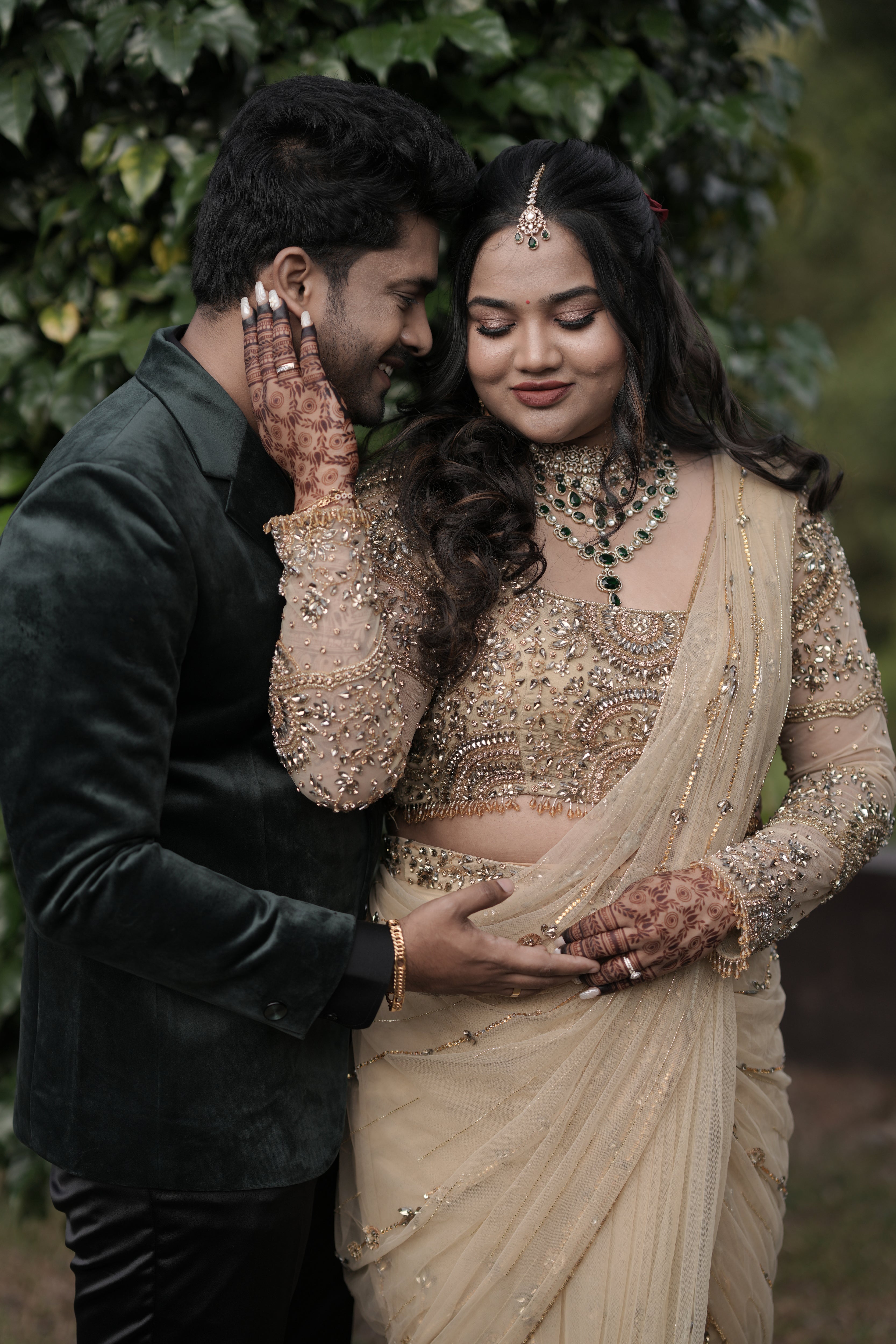 Bride Chithira from Australia, in a golden tulle saree by team Archana Karthick.