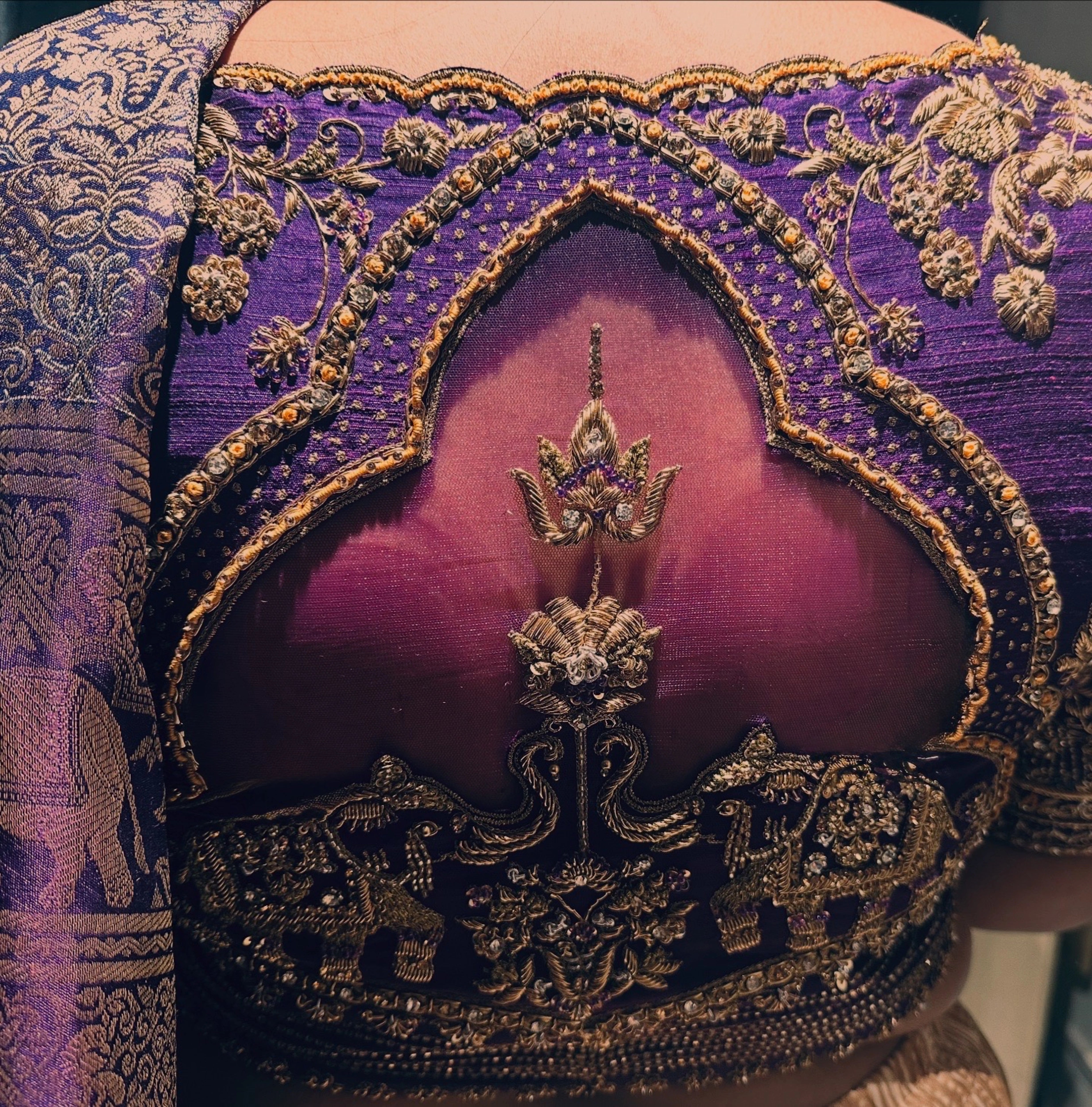 Bride Gayathri in purple silk blouse by team Archana Karthick.